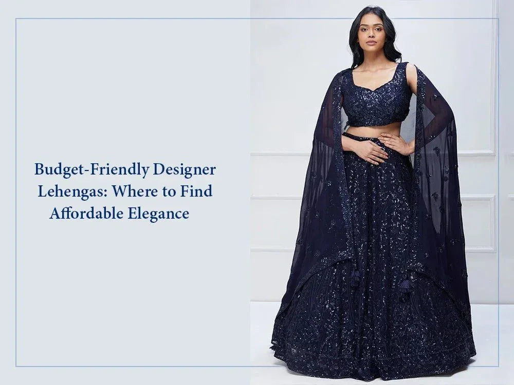 Woman wearing navy blue designer lehenga choli with sequin work and matching dupatta