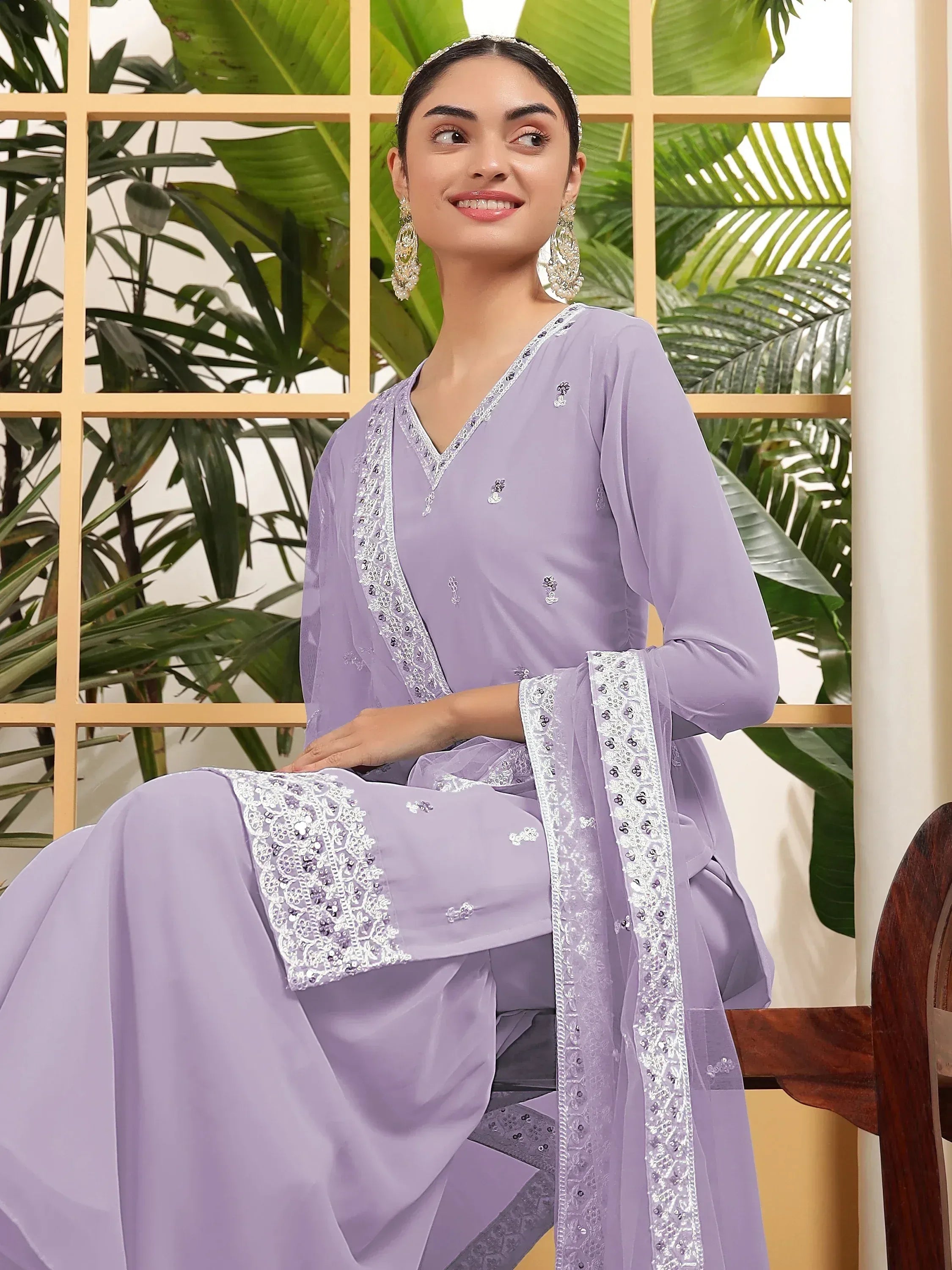 Lavender ethnic salwar kameez with silver embroidery, perfect for Indian festive wear and designer occasions.