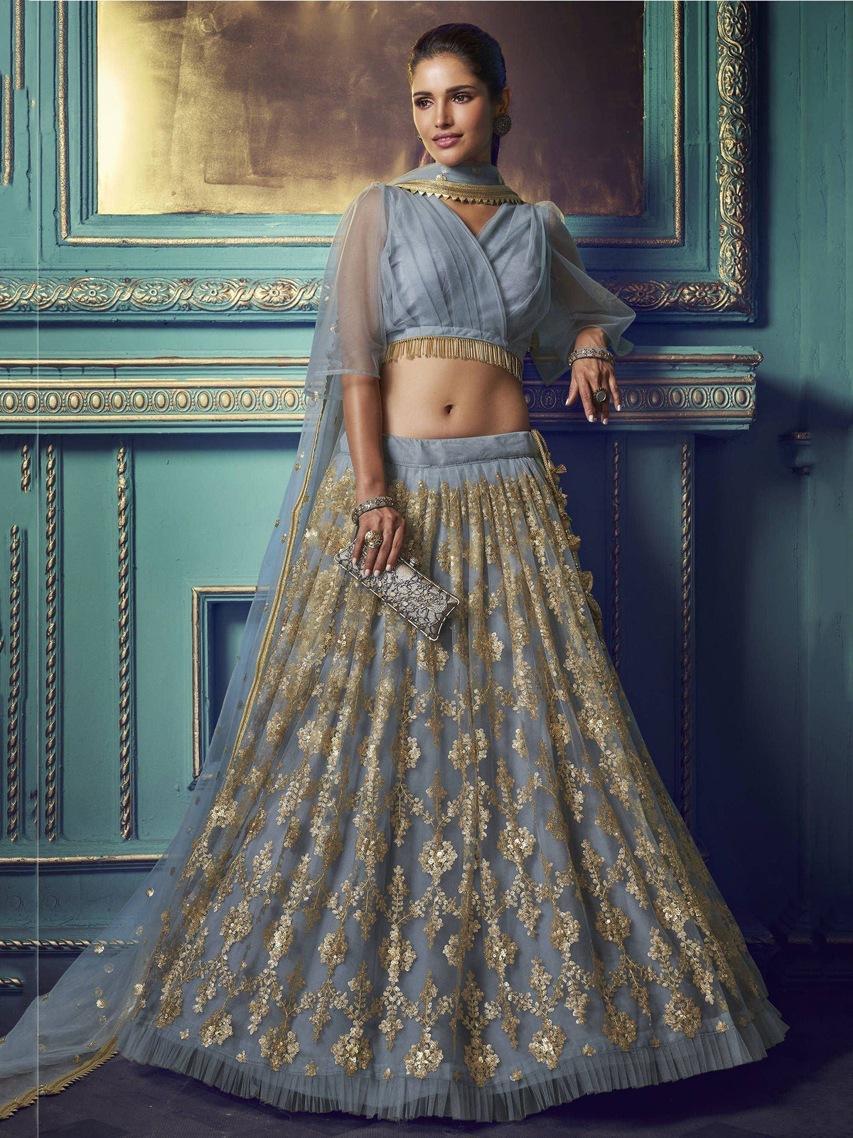 Grey and gold embroidered lehenga choli with sheer dupatta, perfect for Indian weddings and festive occasions