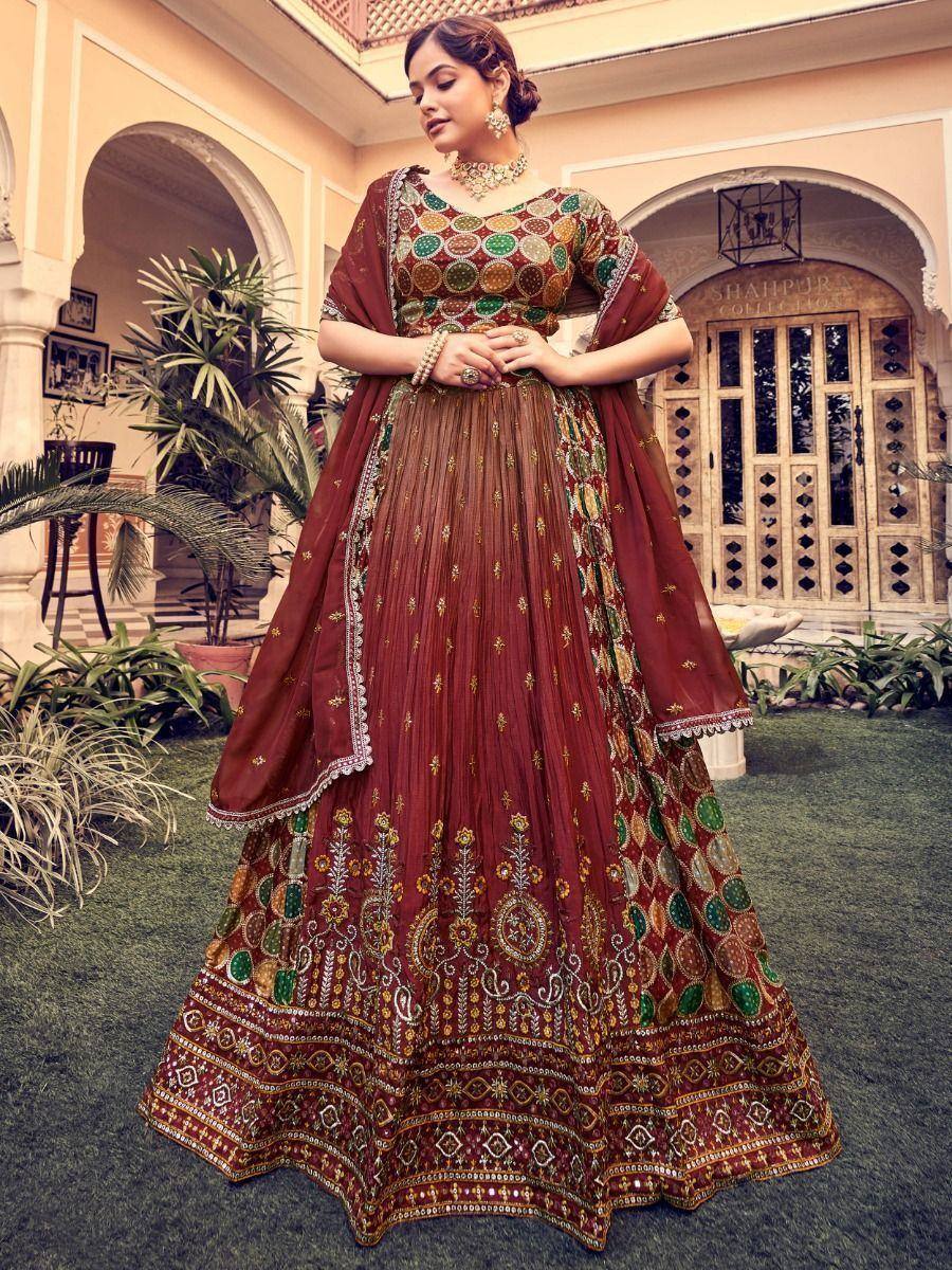 Maroon embroidered lehenga choli with mirror work, perfect for Indian ethnic wear occasions