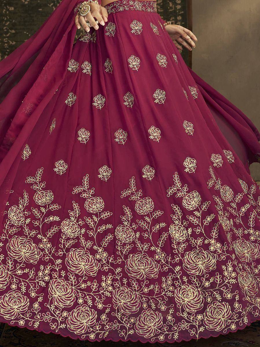 Maroon lehenga with gold floral embroidery, perfect for Indian ethnic wear and festive occasions.