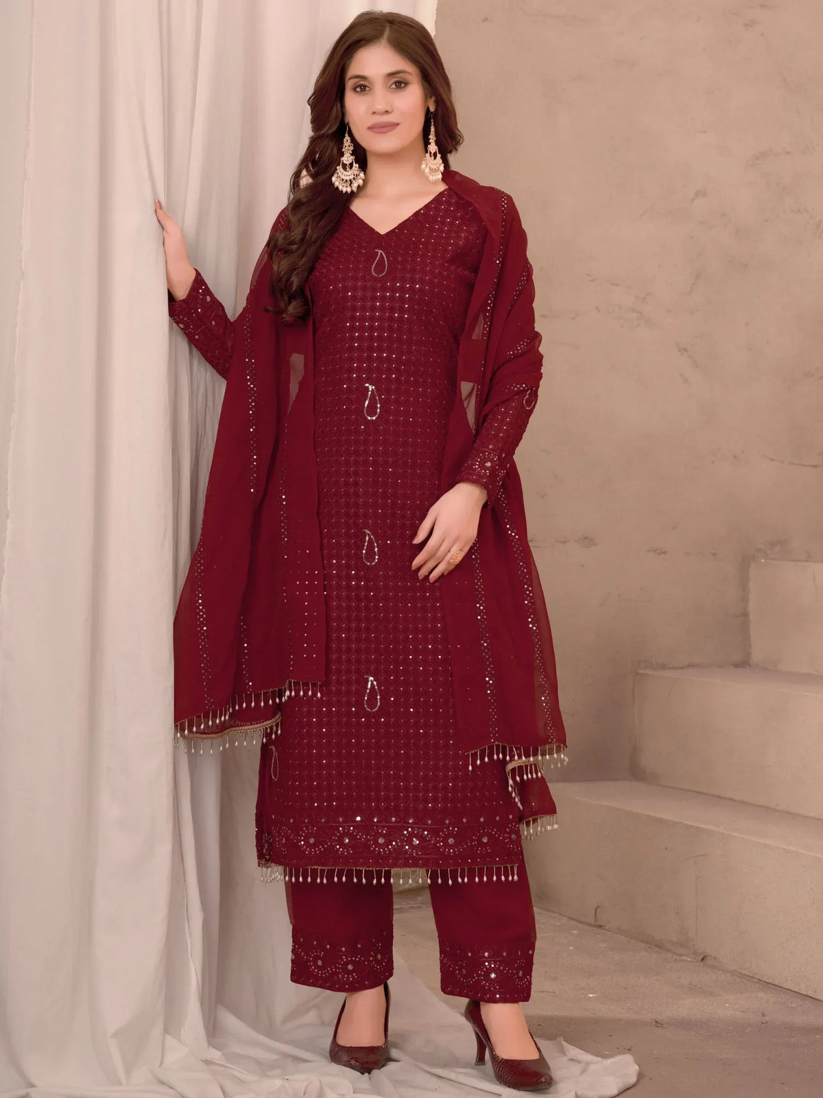 Maroon sequin-embellished salwar kameez with matching dupatta, perfect for ethnic occasions
