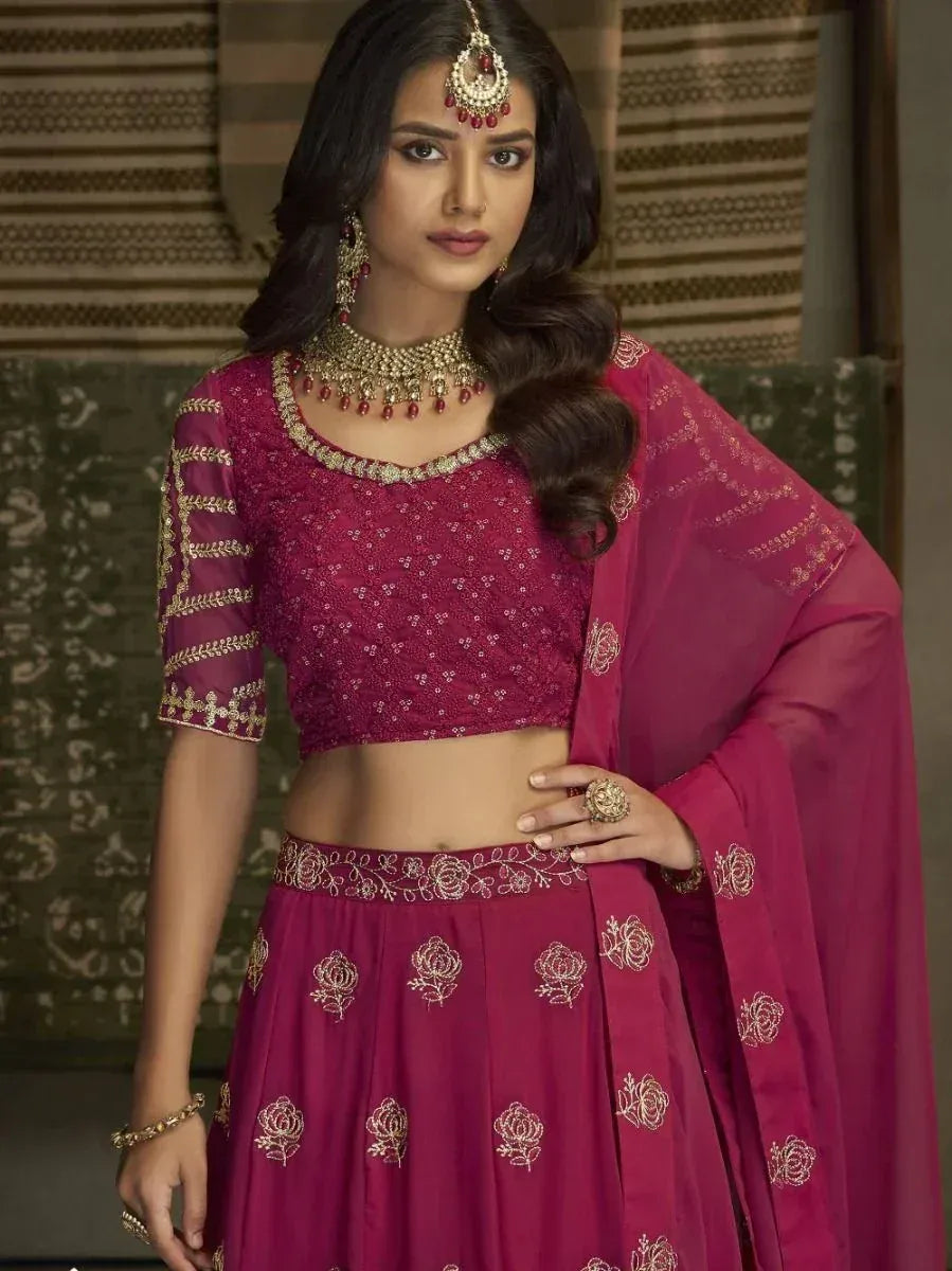 Maroon embroidered lehenga choli with gold detailing, perfect for Indian ethnic wear occasions