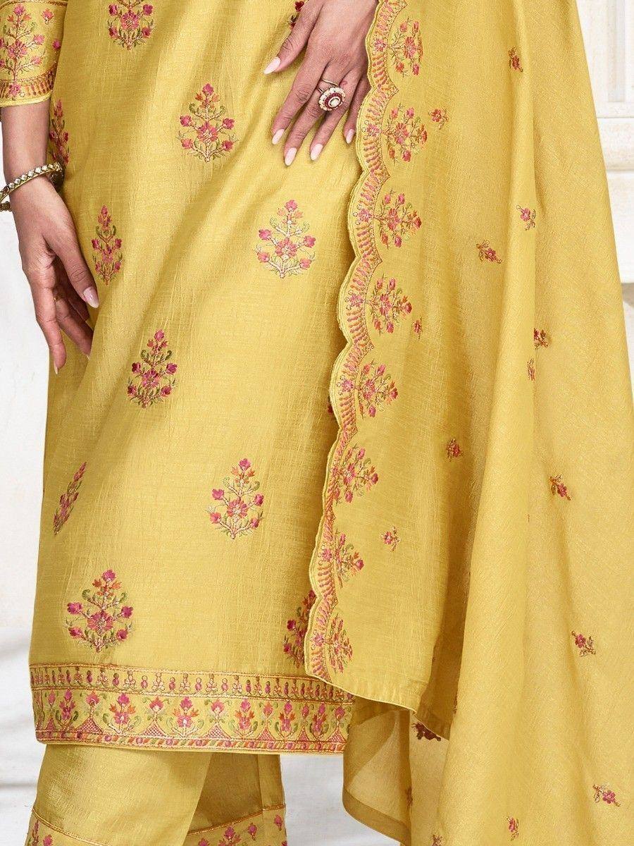 Yellow embroidered salwar kameez with floral motifs and scalloped dupatta border