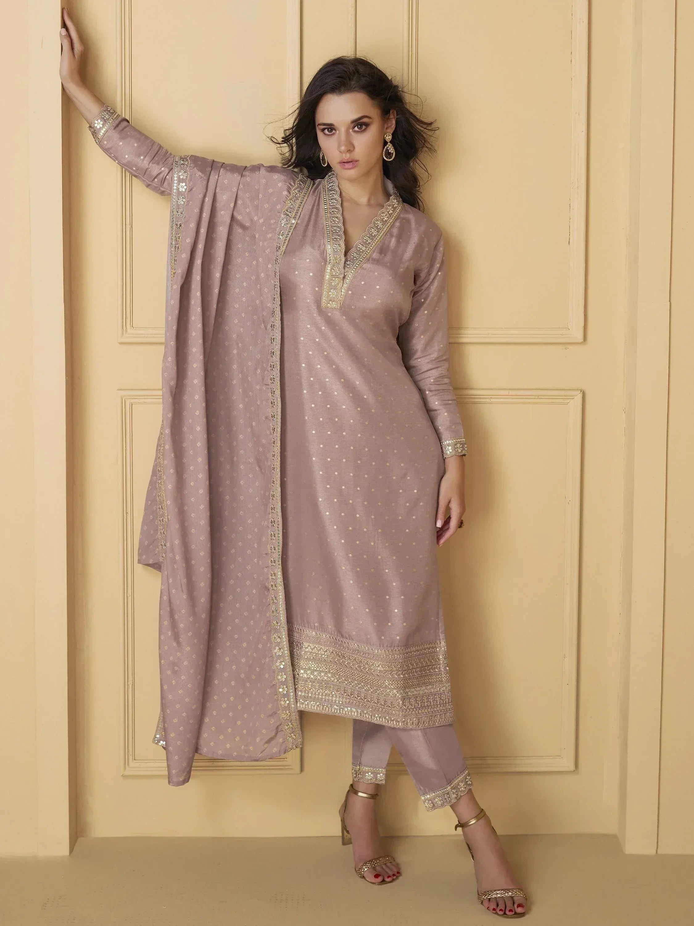Elegant mauve salwar kameez with gold embroidery, perfect for Indian ethnic wear occasions