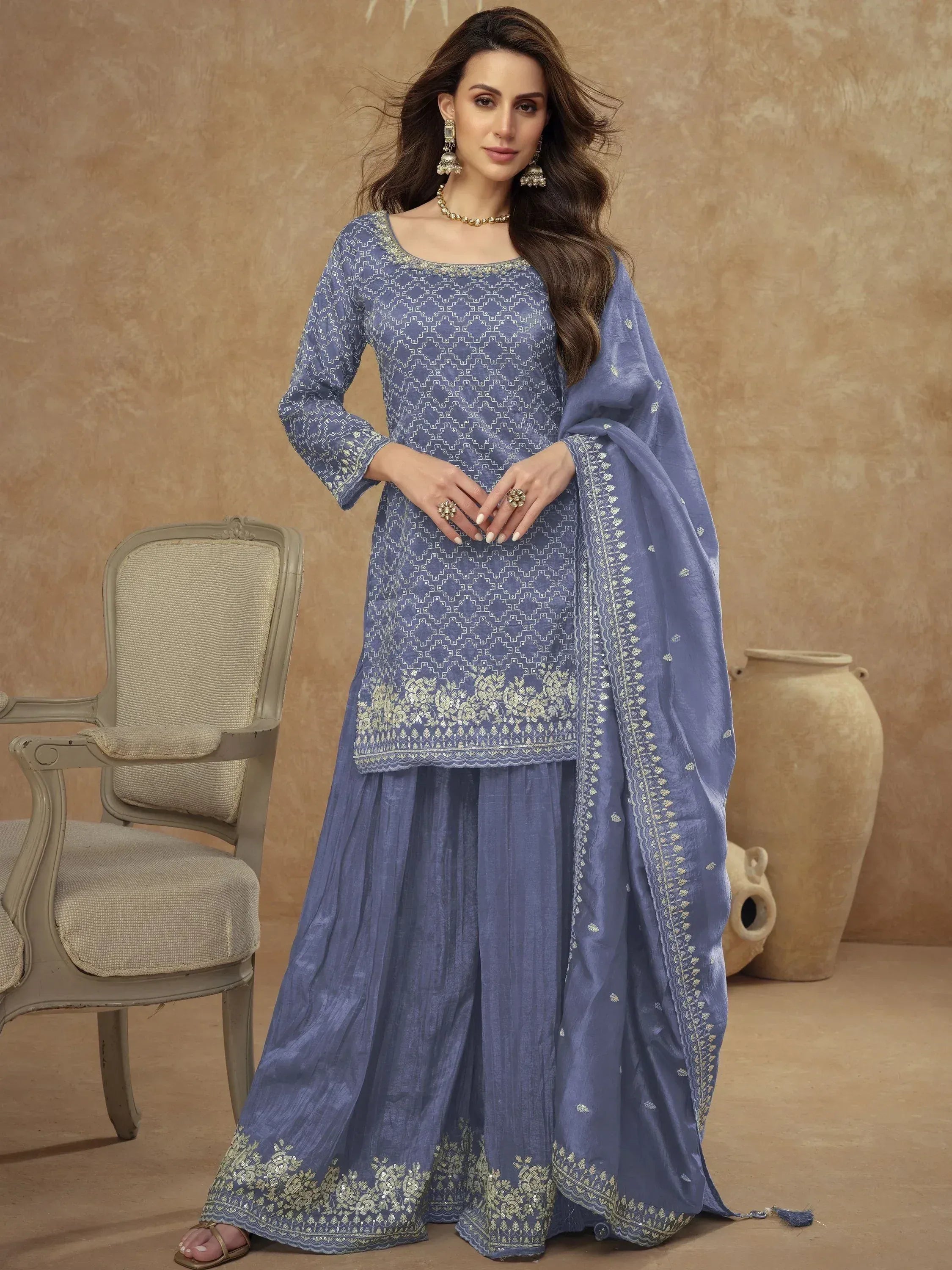 Blue embroidered salwar kameez with geometric print, perfect for Indian ethnic wear occasions