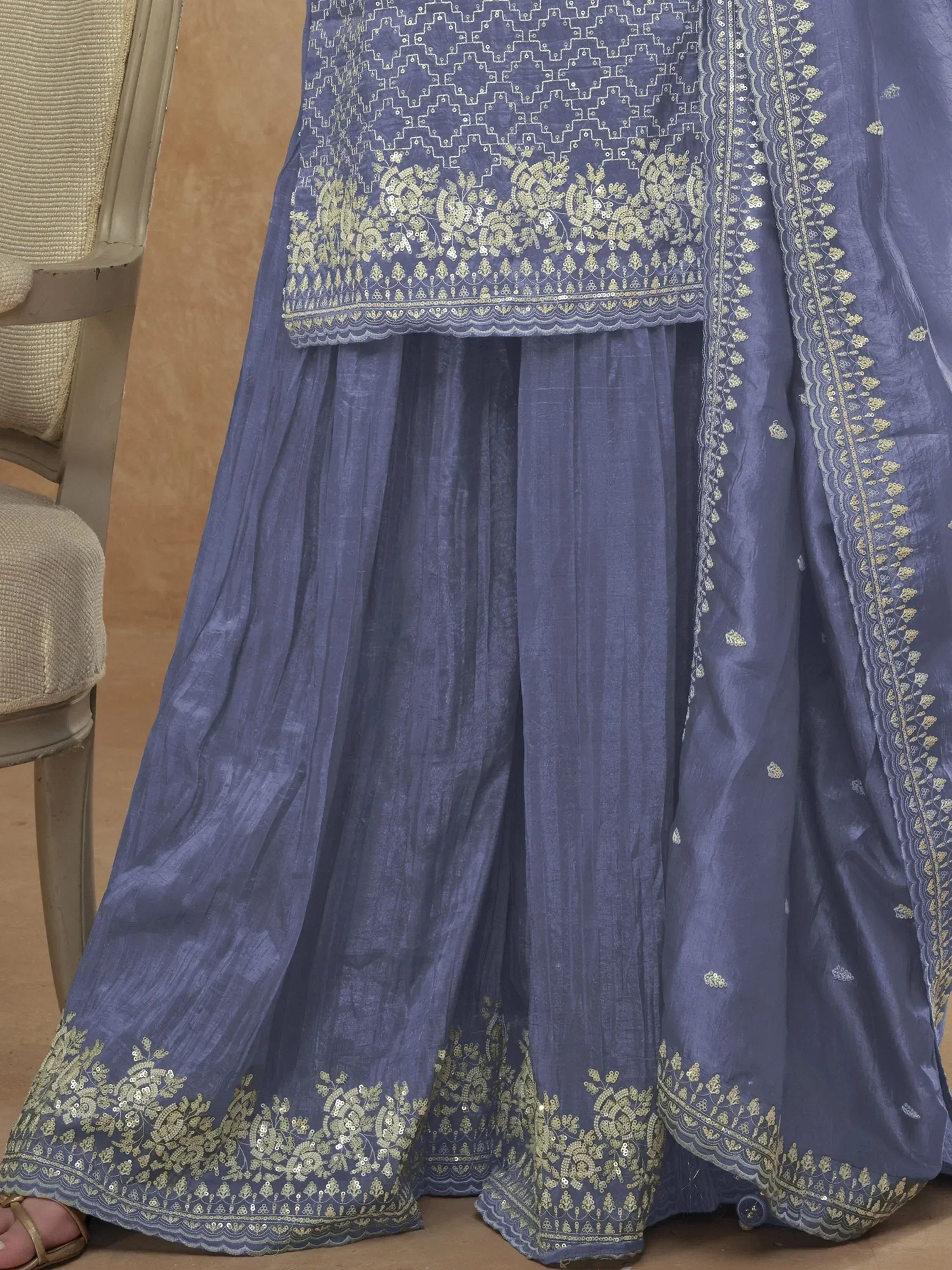 Blue embroidered lehenga choli with gold floral work, perfect for Indian ethnic wear occasions