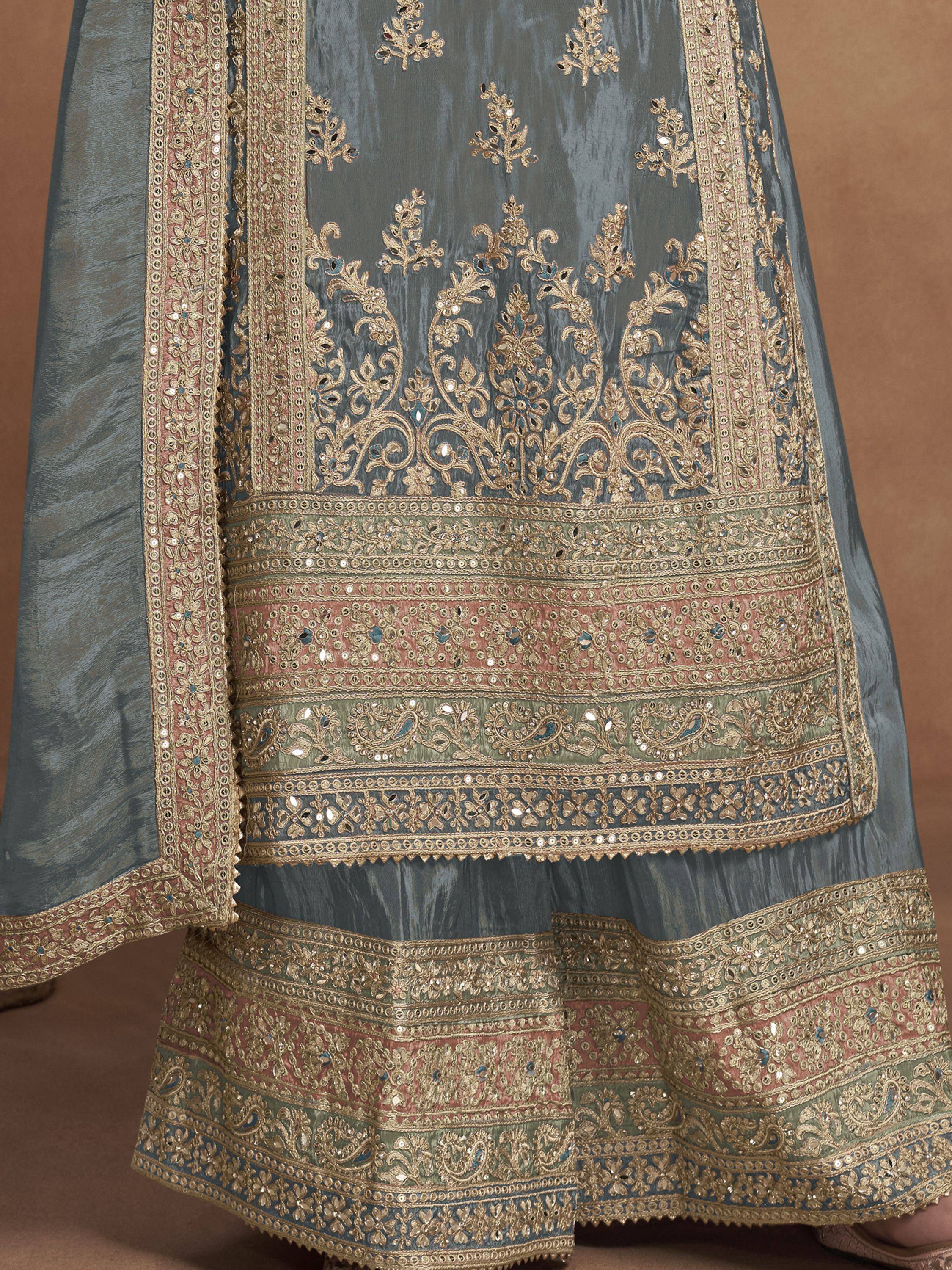 Elegant blue lehenga with gold and pink embroidery, perfect for Indian ethnic wear