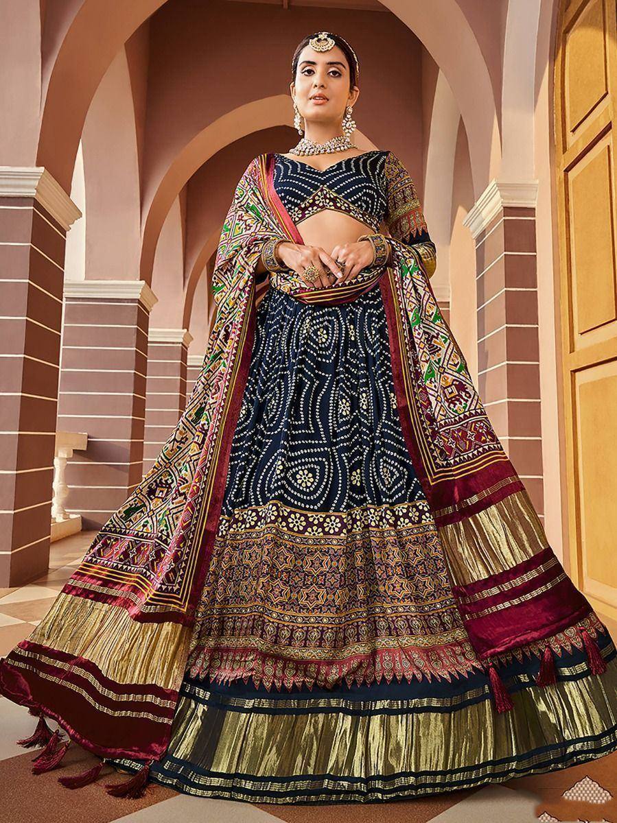 Elegant navy blue lehenga choli with intricate embroidery and colorful dupatta, perfect for Indian ethnic wear