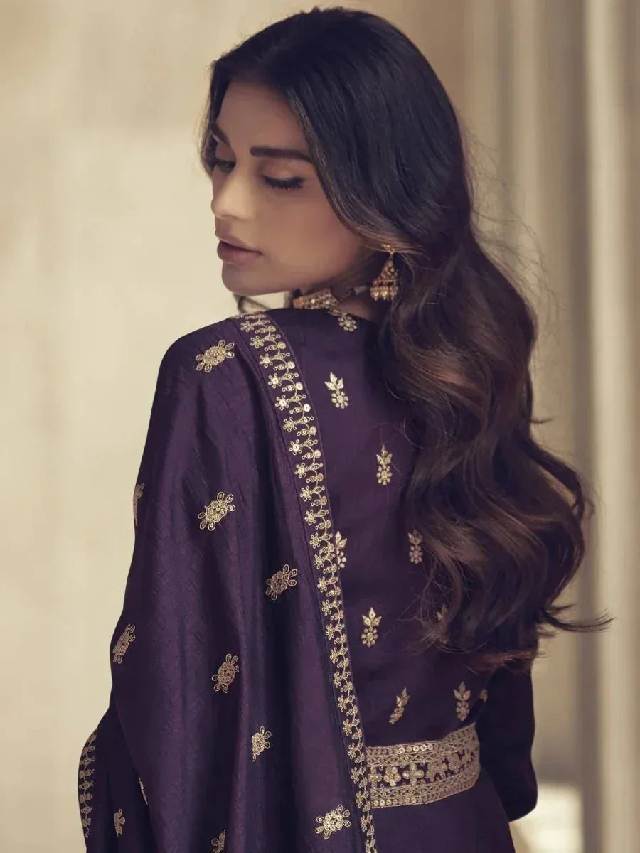 Purple embroidered salwar kameez with gold detailing, perfect for ethnic occasions