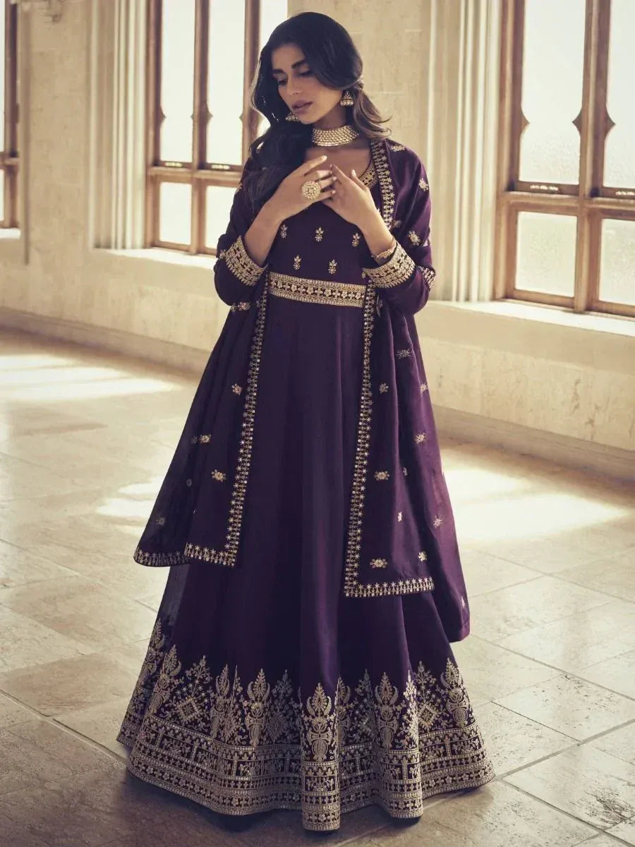 Elegant purple designer anarkali with gold embroidery, perfect for Indian ethnic occasions