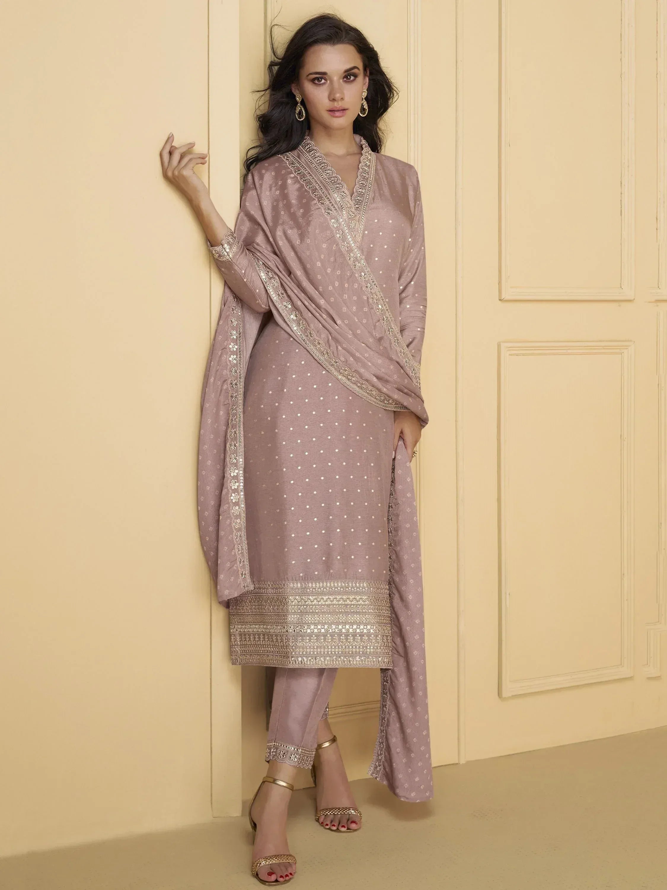 Elegant mauve salwar kameez with gold embroidery, perfect for Indian ethnic wear occasions