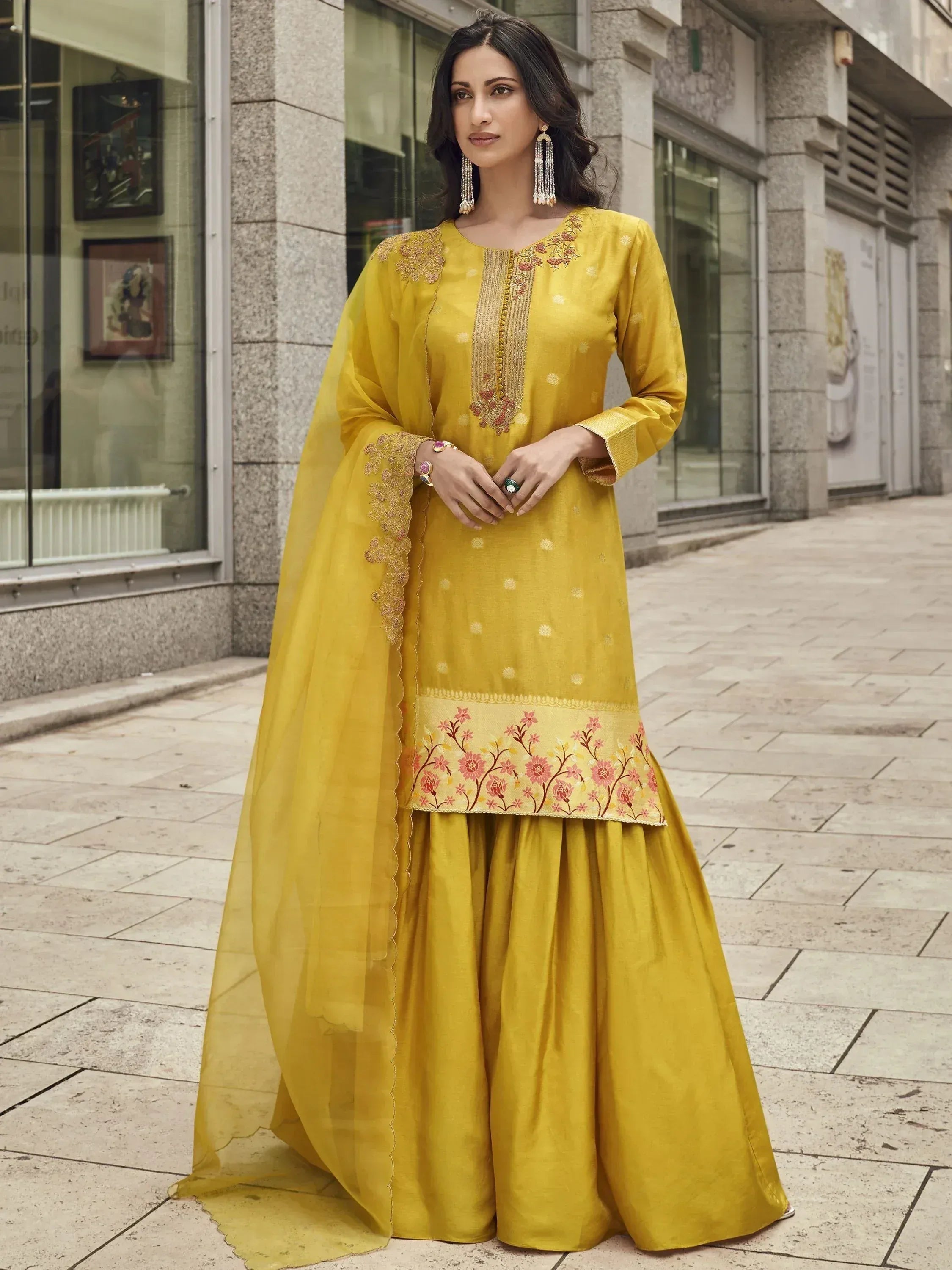 Yellow embroidered ethnic gown with floral detailing and matching dupatta for women