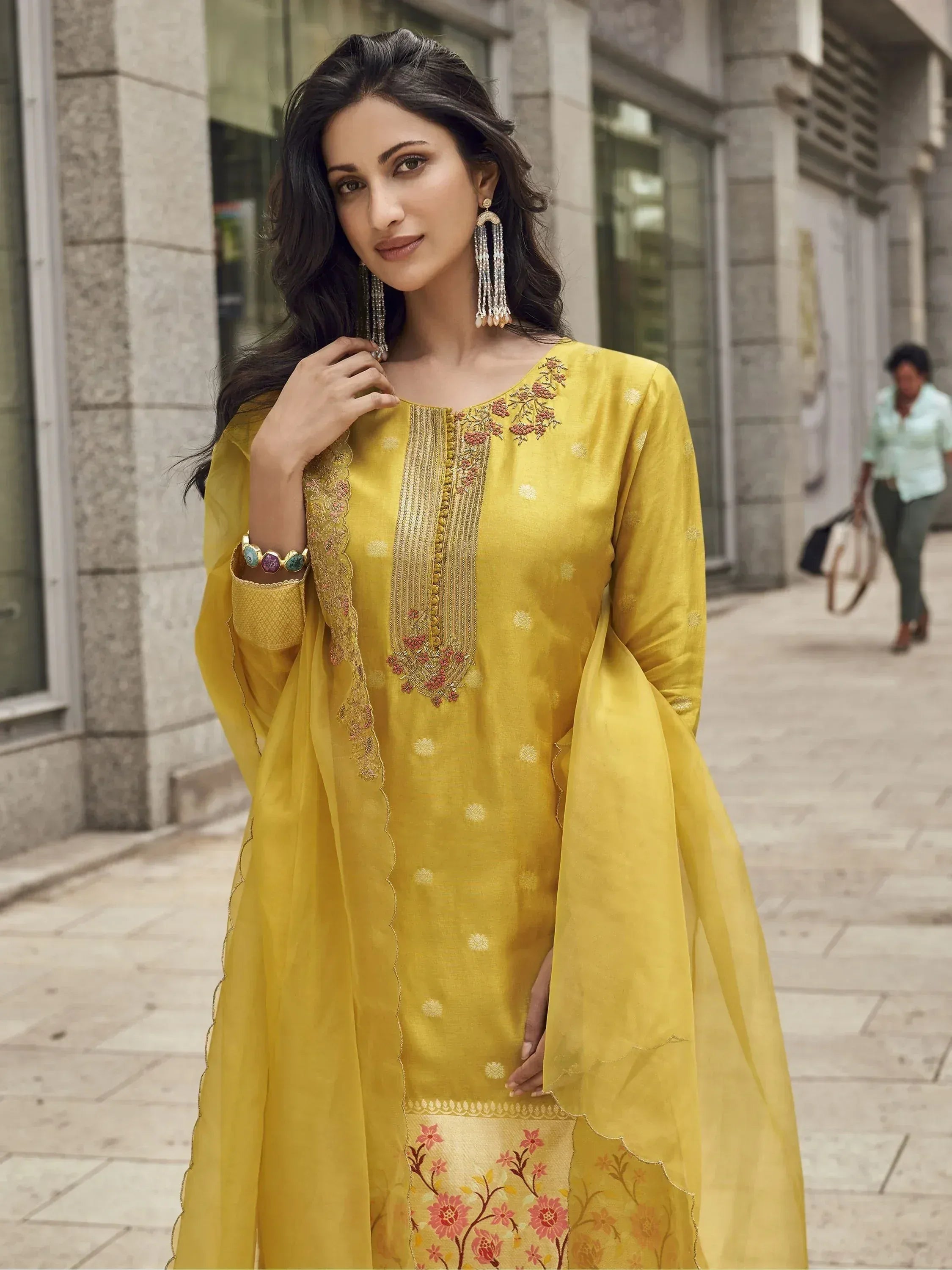Yellow embroidered ethnic kurti with floral designs and matching dupatta