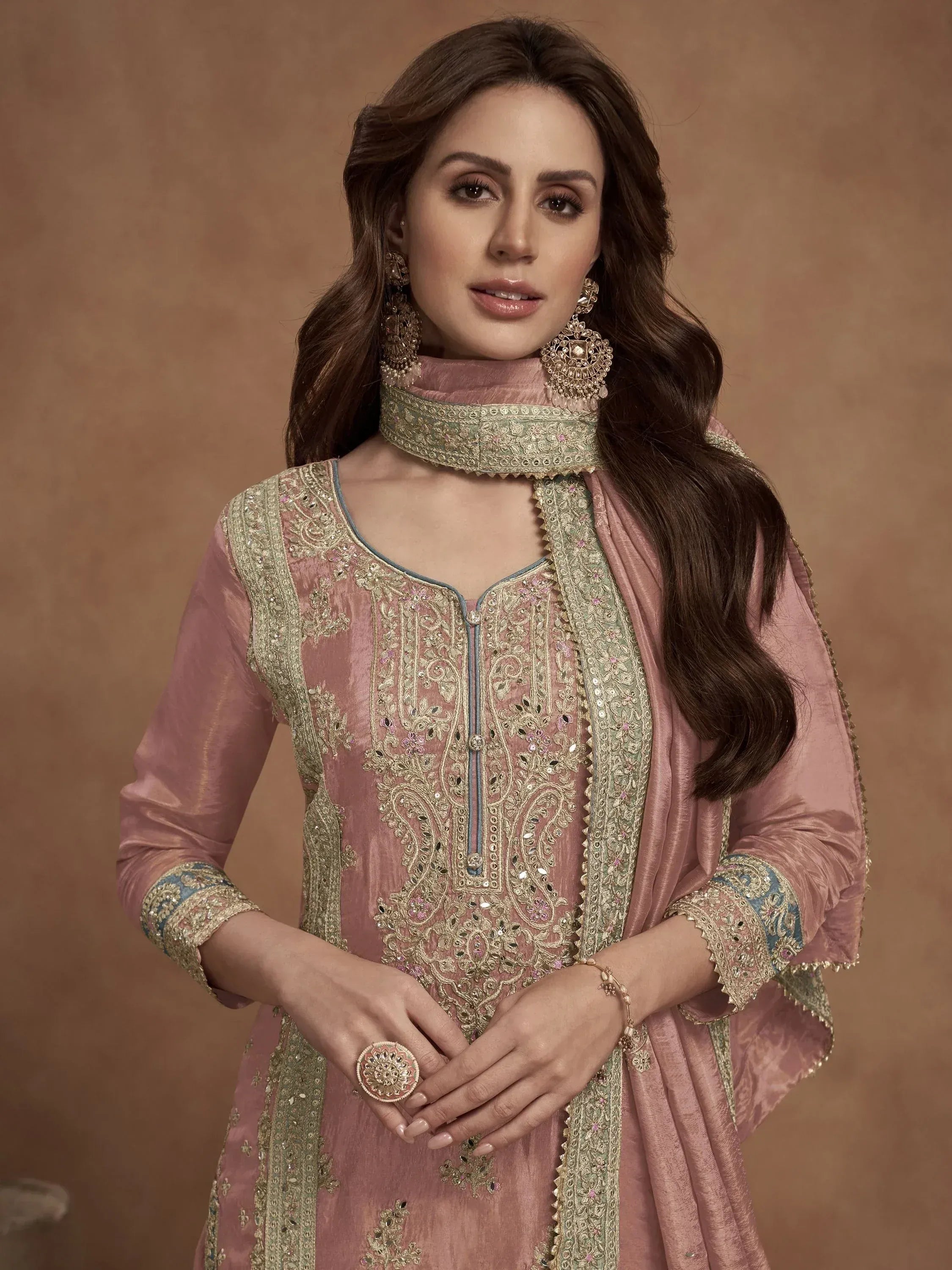 Elegant pink embroidered salwar kameez with gold detailing and matching dupatta