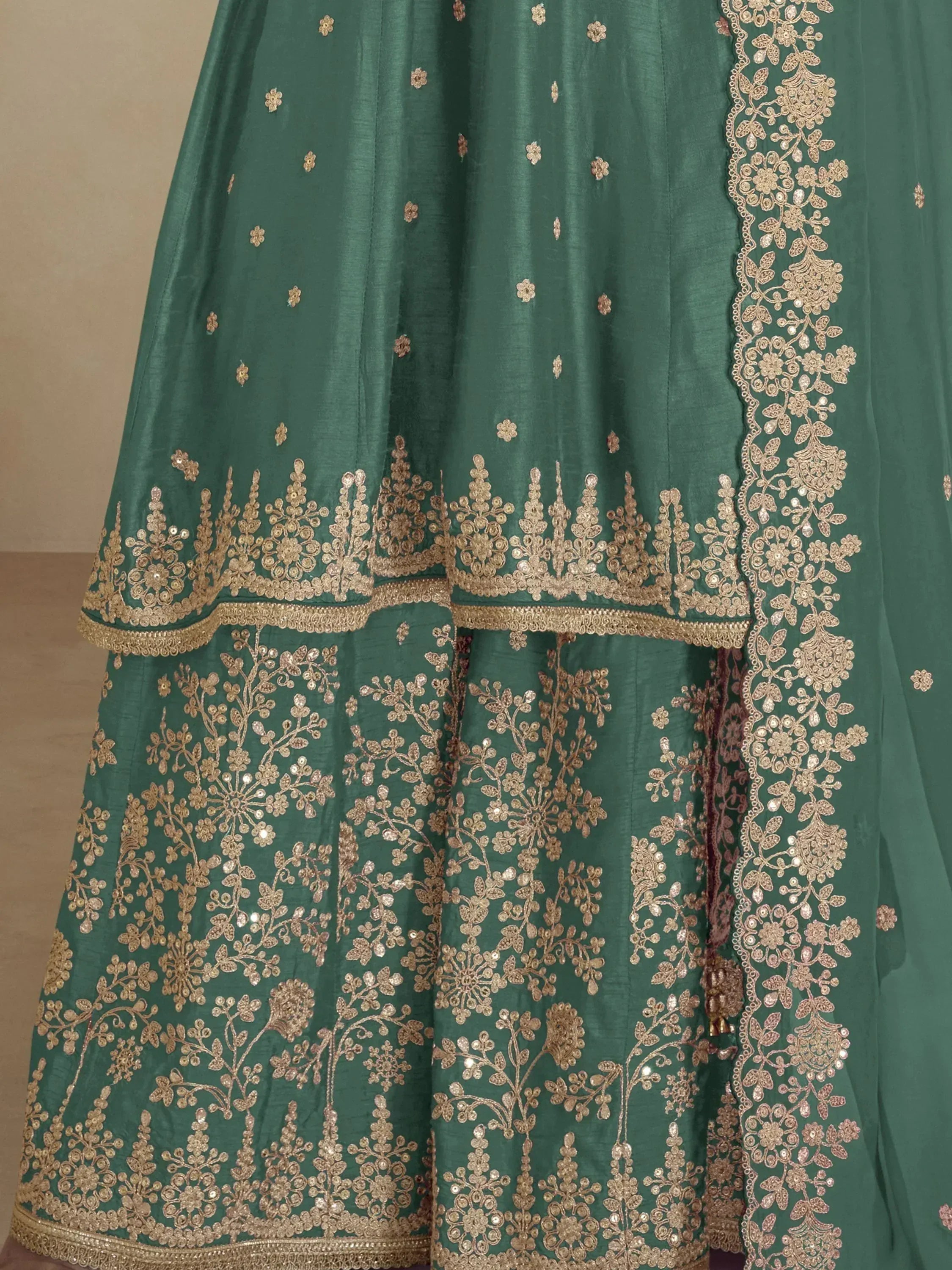 Emerald green lehenga with gold floral embroidery and sequin detailing for Indian ethnic wear