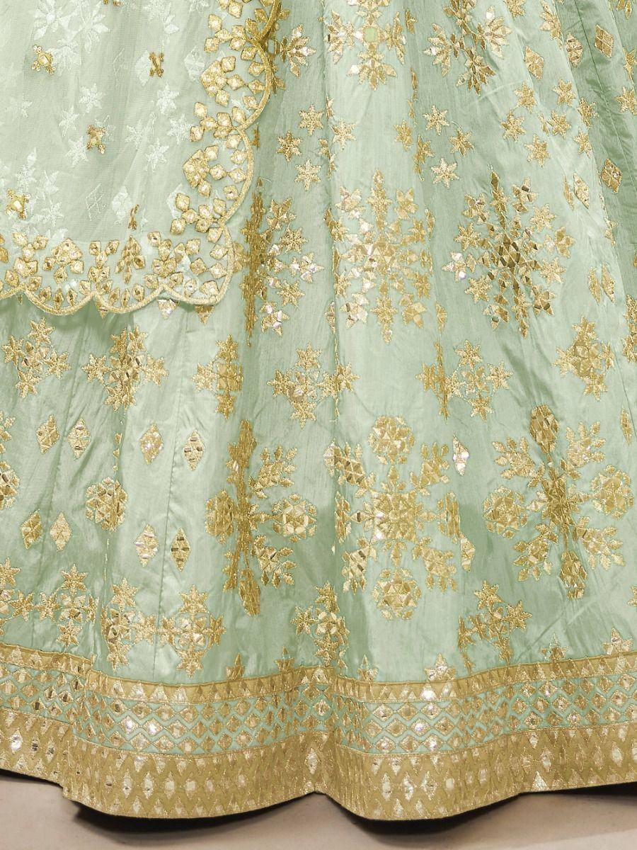 Mint green lehenga with gold floral embroidery and mirror work, ethnic Indian wedding wear