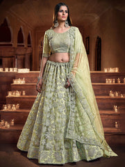 Enchanting Light Green Sequins Embroidered Net Wedding Wear Lehenga Choli
