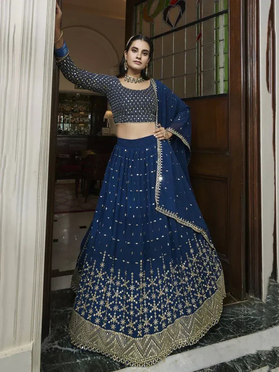 Elegant navy blue lehenga choli with gold embroidery, perfect for Indian ethnic occasions