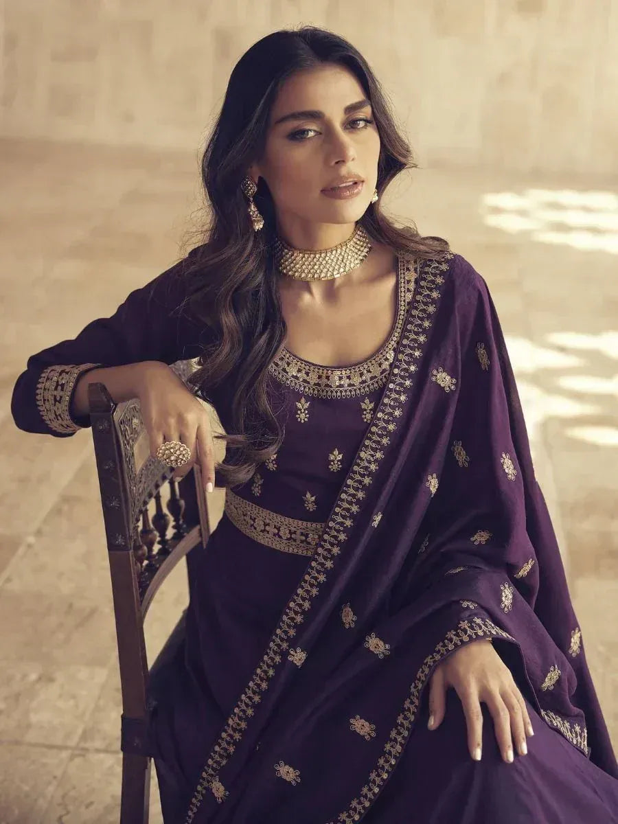 Elegant purple ethnic salwar kameez with gold embroidery, perfect for Indian festive occasions
