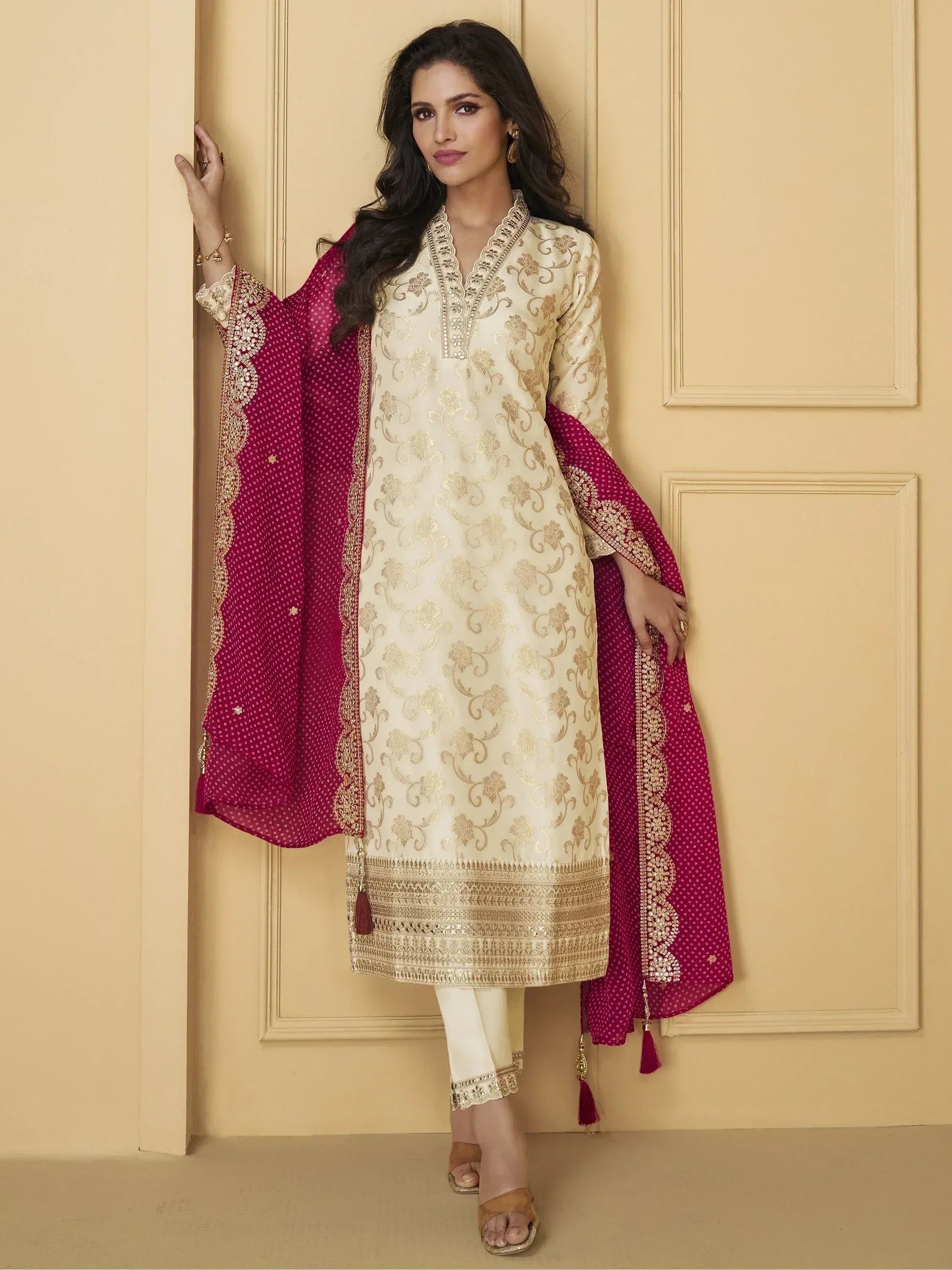Cream and maroon embroidered salwar kameez with gold detailing, perfect for Indian ethnic occasions