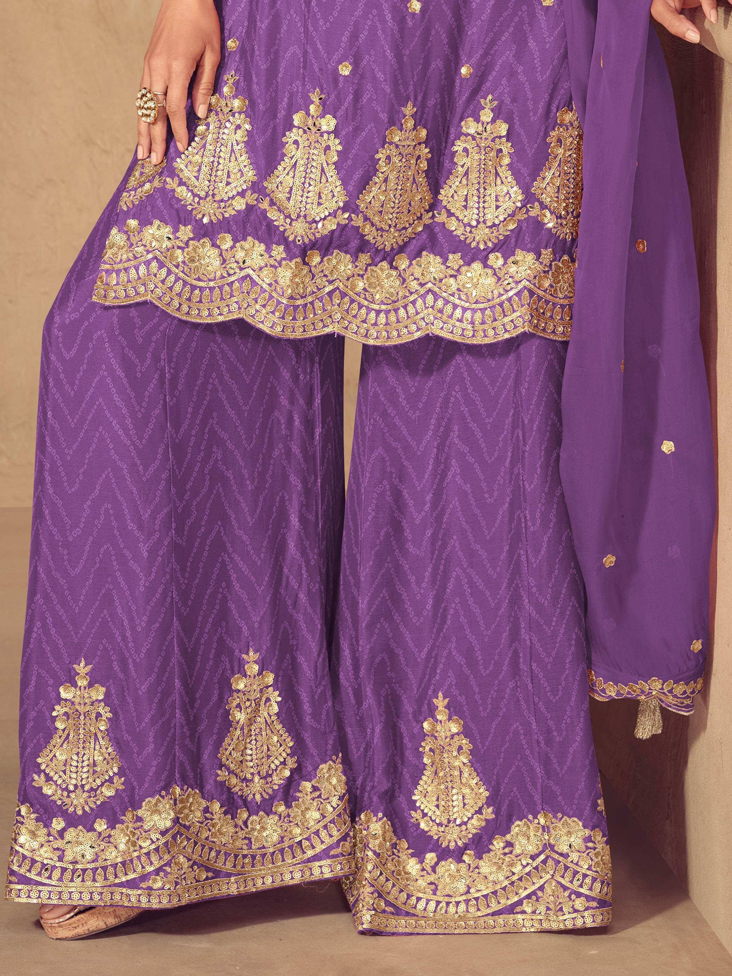 Purple ethnic salwar kameez with gold embroidery and sequin work, perfect for Indian occasions.