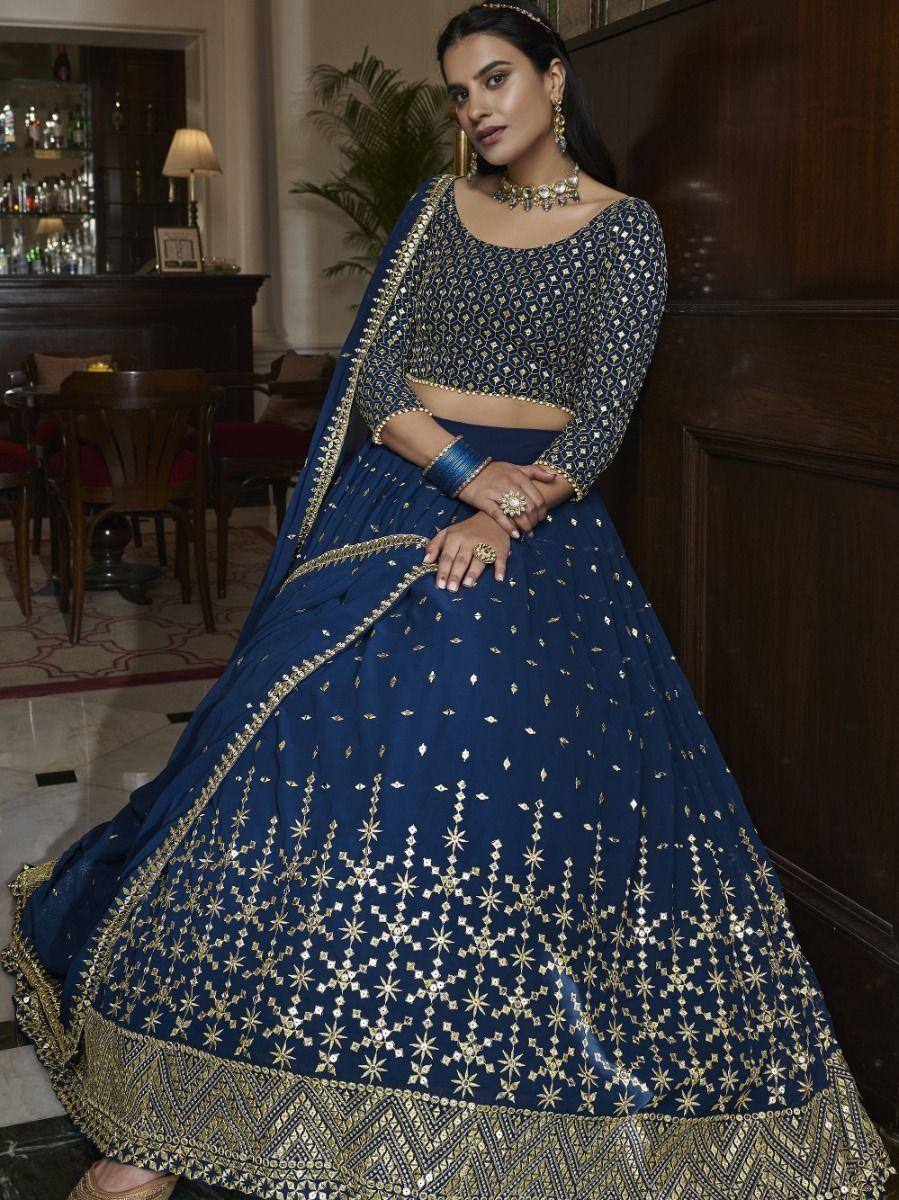 Navy blue designer lehenga choli with gold embroidery, perfect for weddings and festive occasions