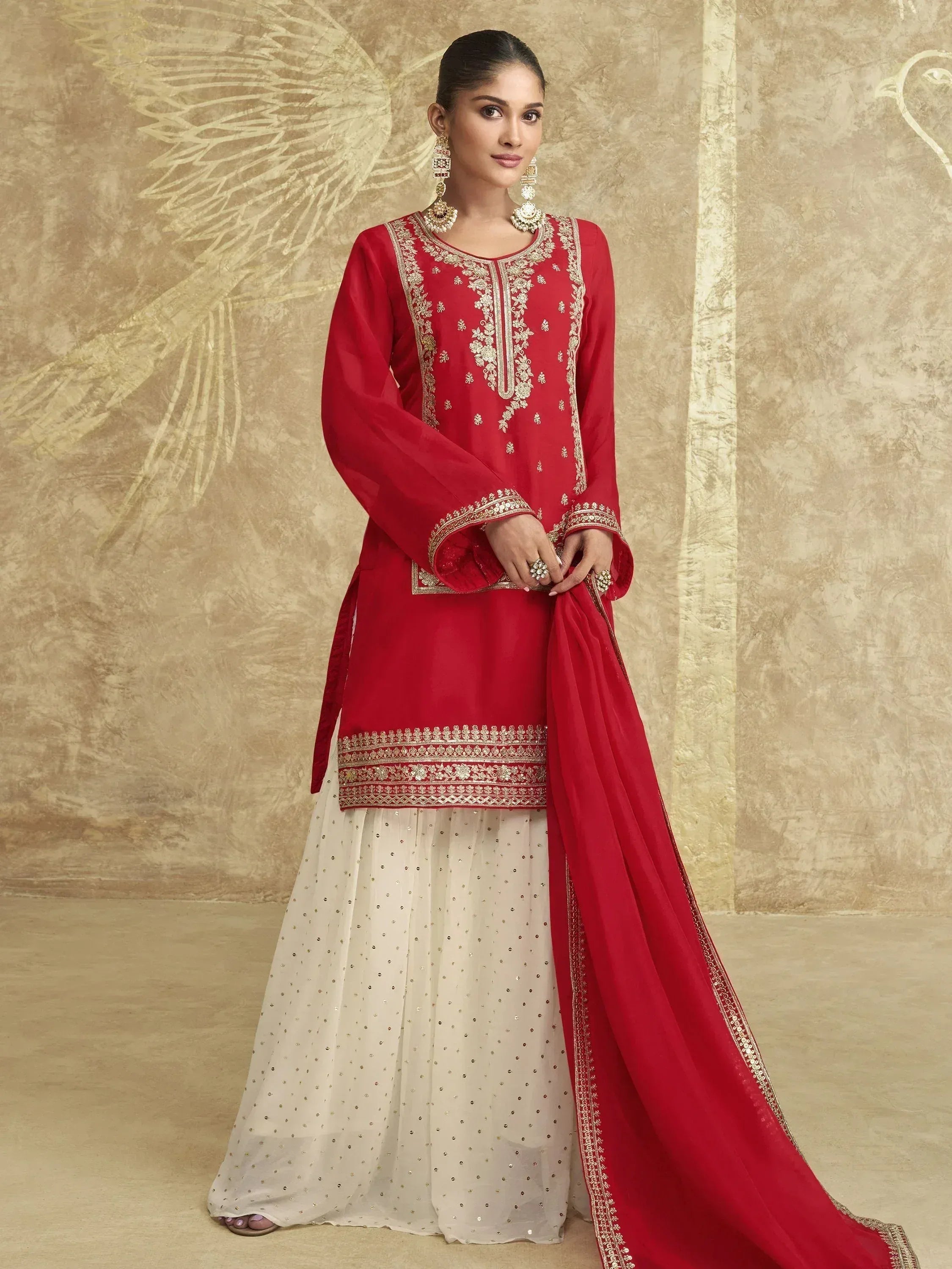 Red embroidered ethnic salwar kameez with white sequined skirt and dupatta