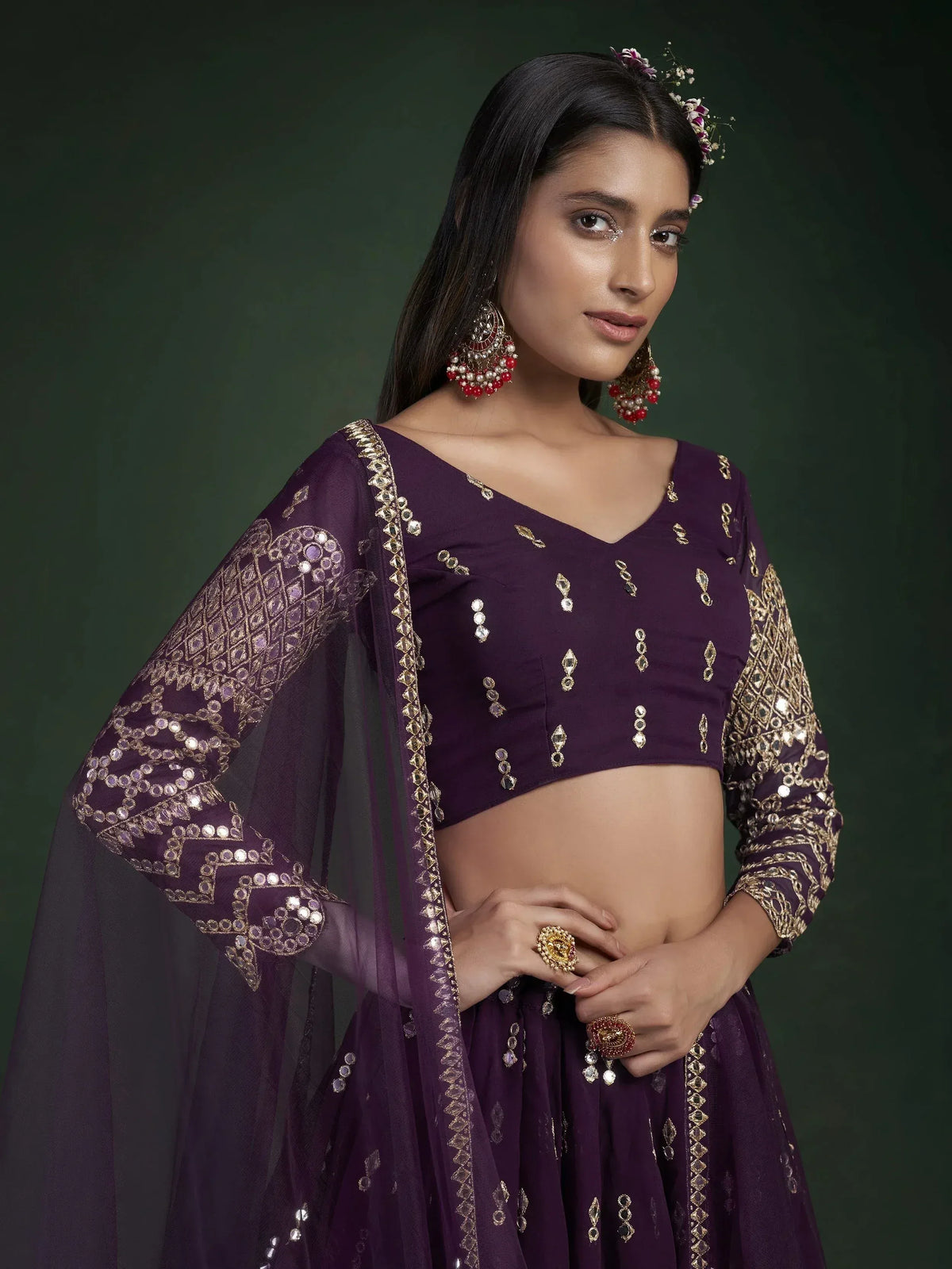 Purple designer lehenga choli with gold mirror work, perfect for Indian ethnic wear and festive occasions.