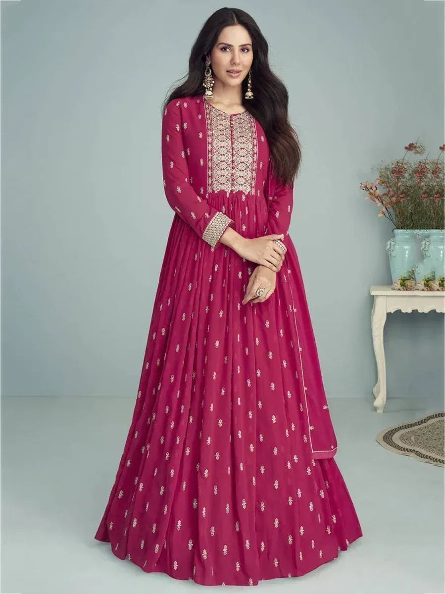 Pink embroidered anarkali gown with gold detailing, perfect for Indian ethnic occasions