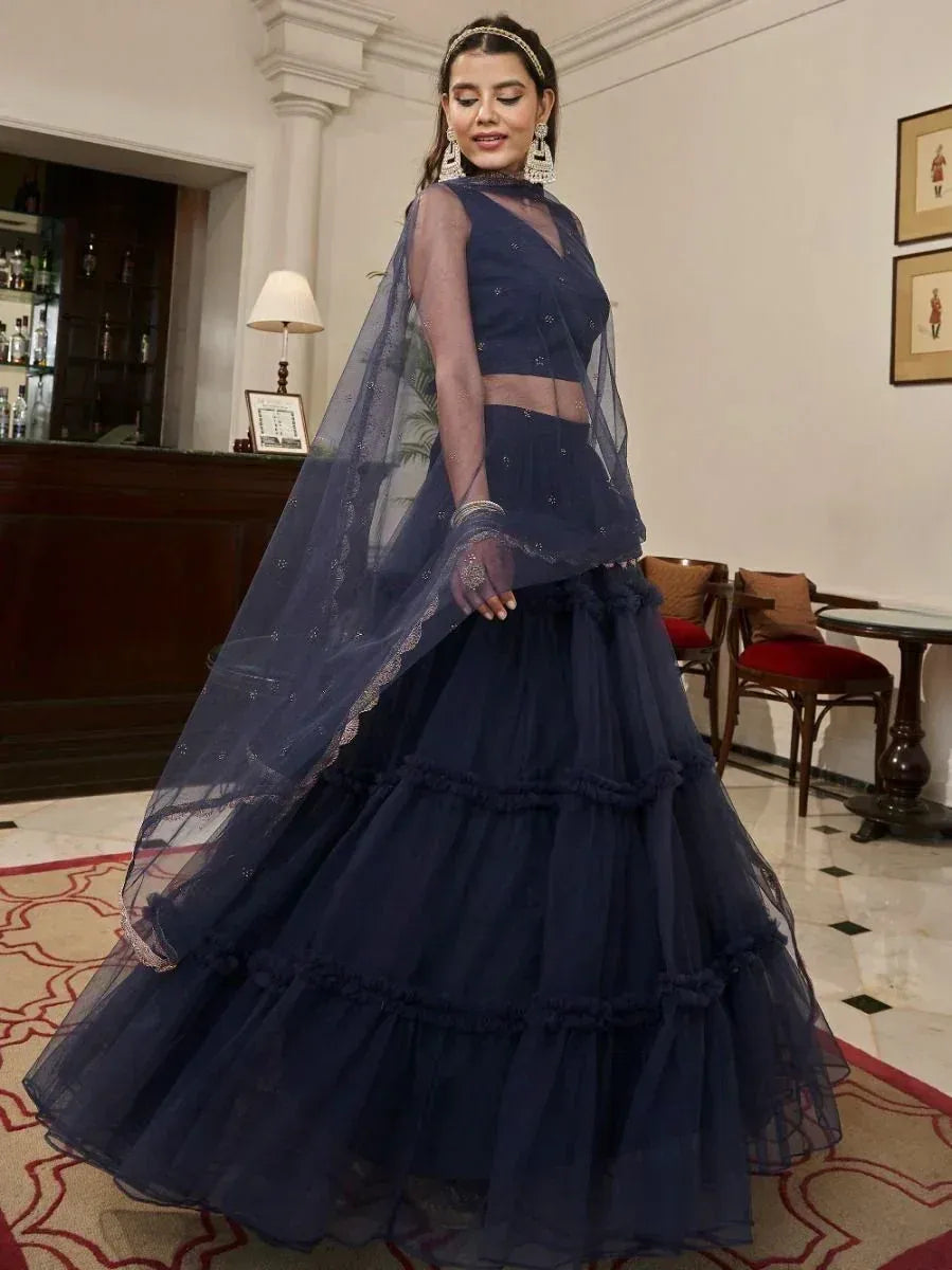 Navy blue designer lehenga choli with sheer dupatta, perfect for weddings and festive occasions