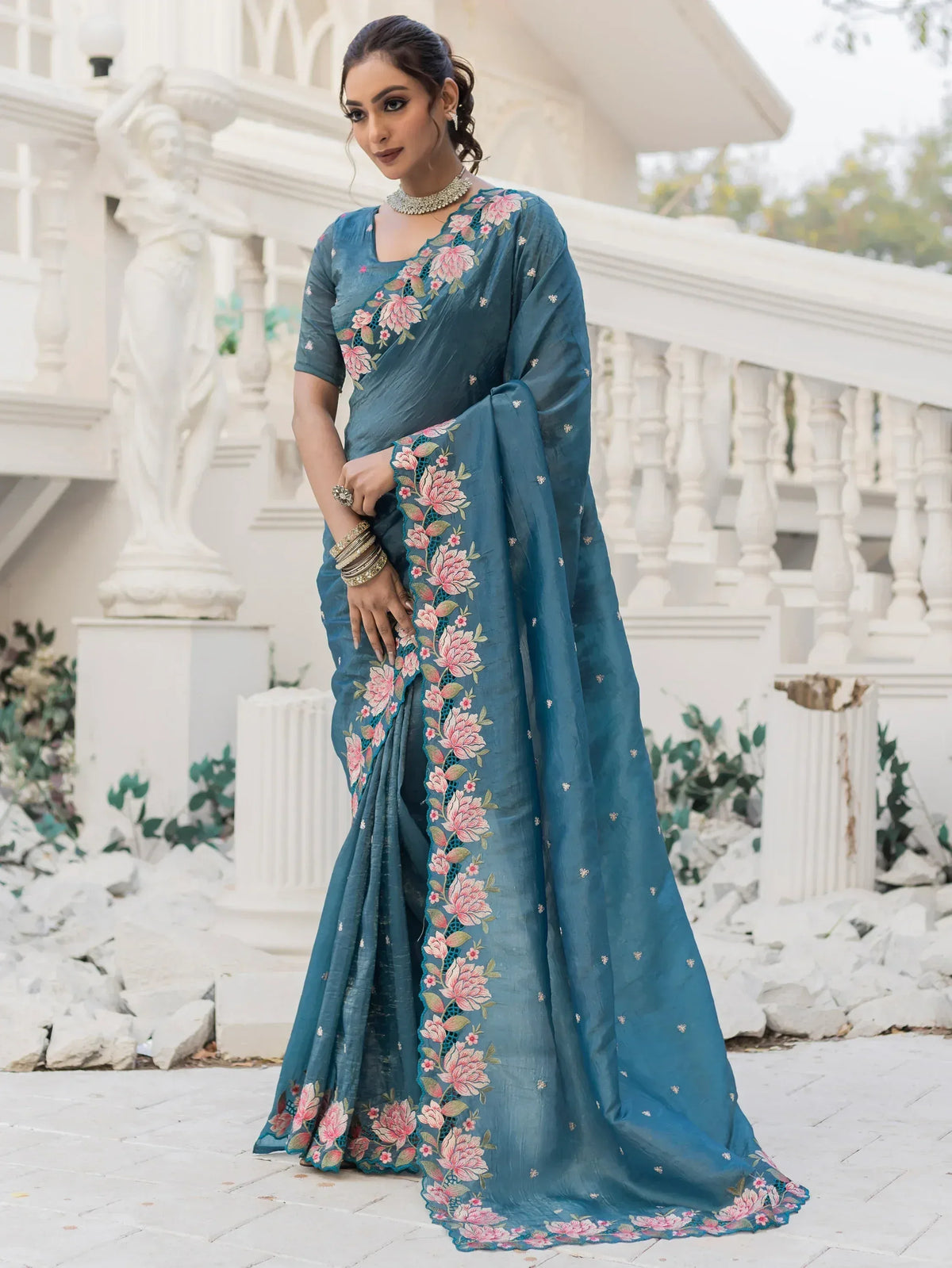 Teal saree with pink floral embroidery, elegant Indian ethnic wear for women