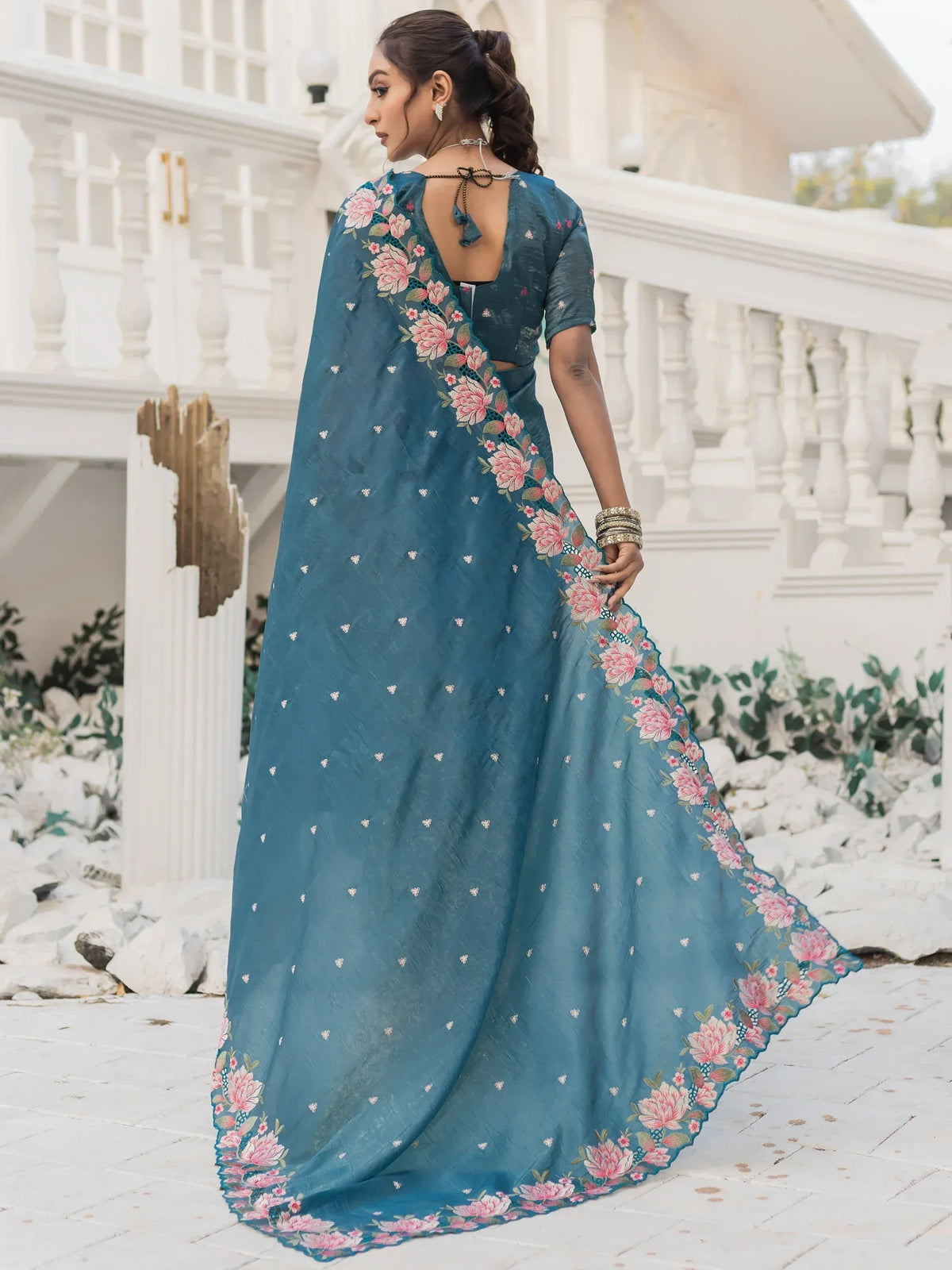 Teal blue saree with pink floral embroidery, back view, ethnic Indian wear