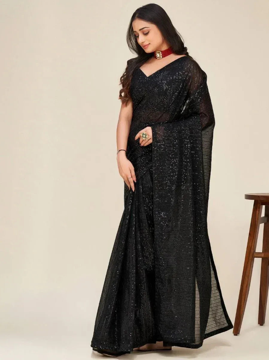 Black sequin saree with sheer blouse, elegant Indian ethnic wear for parties
