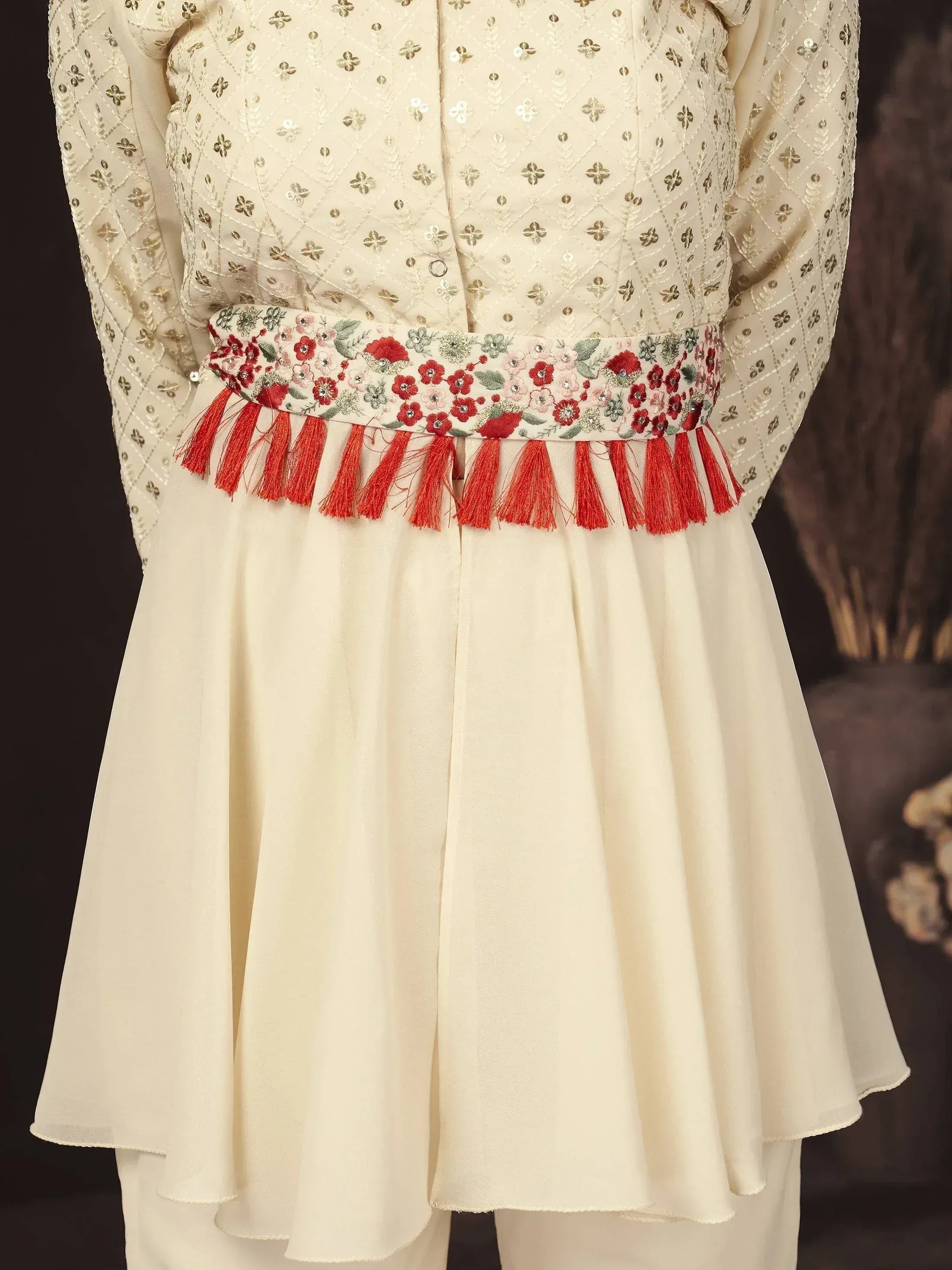 Cream embroidered kurti with floral red waistbelt and tassels, Indian ethnic wear
