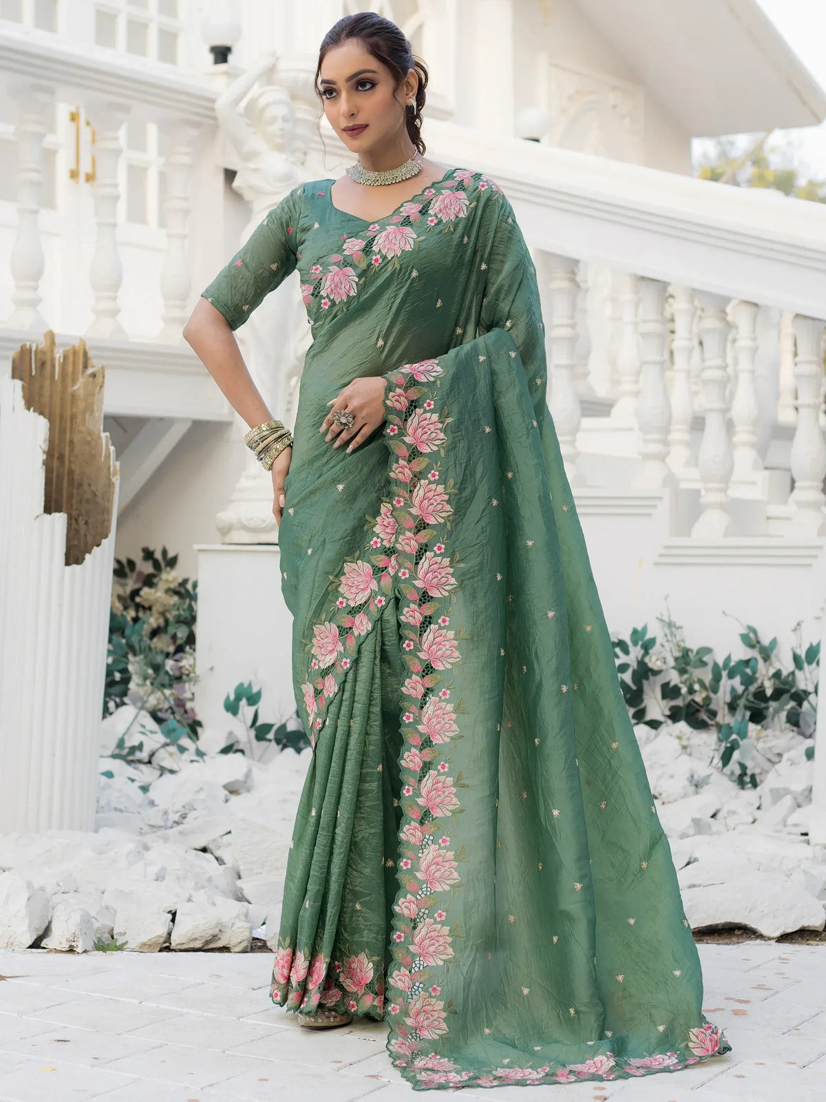 Green floral embroidered saree with pink flowers, perfect for Indian ethnic wear occasions