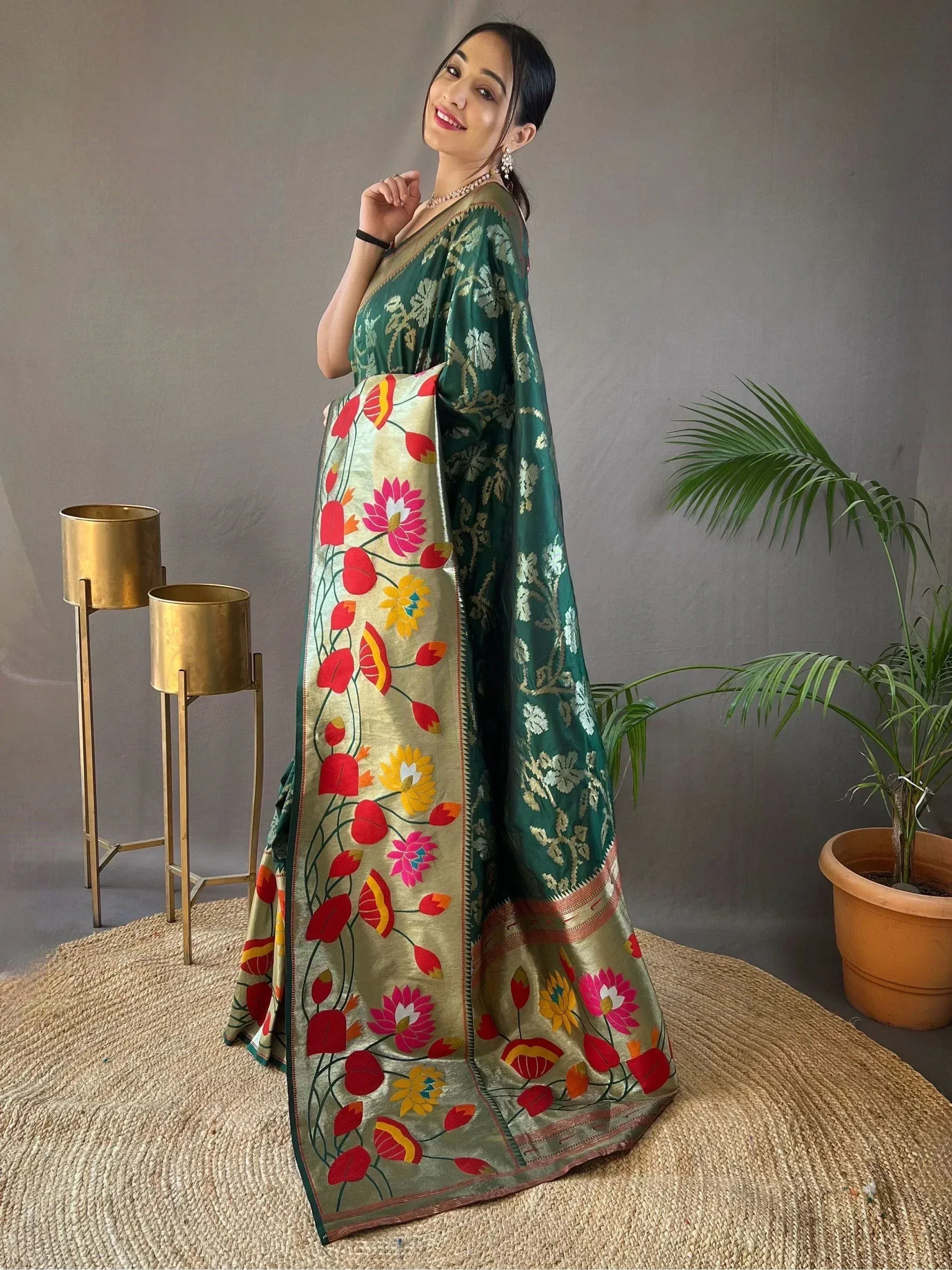 Green floral saree with vibrant embroidery, perfect for ethnic wear occasions