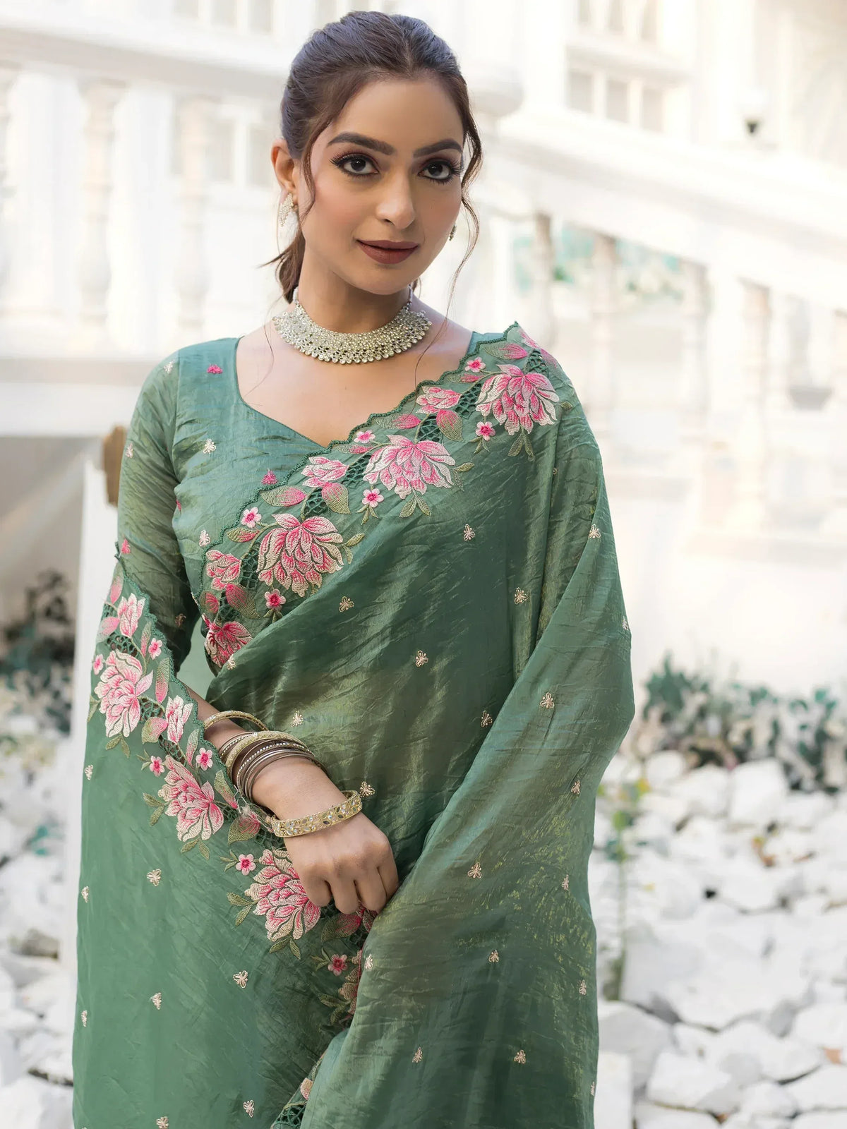 Green floral embroidered salwar kameez with pink flowers, perfect for Indian ethnic wear occasions