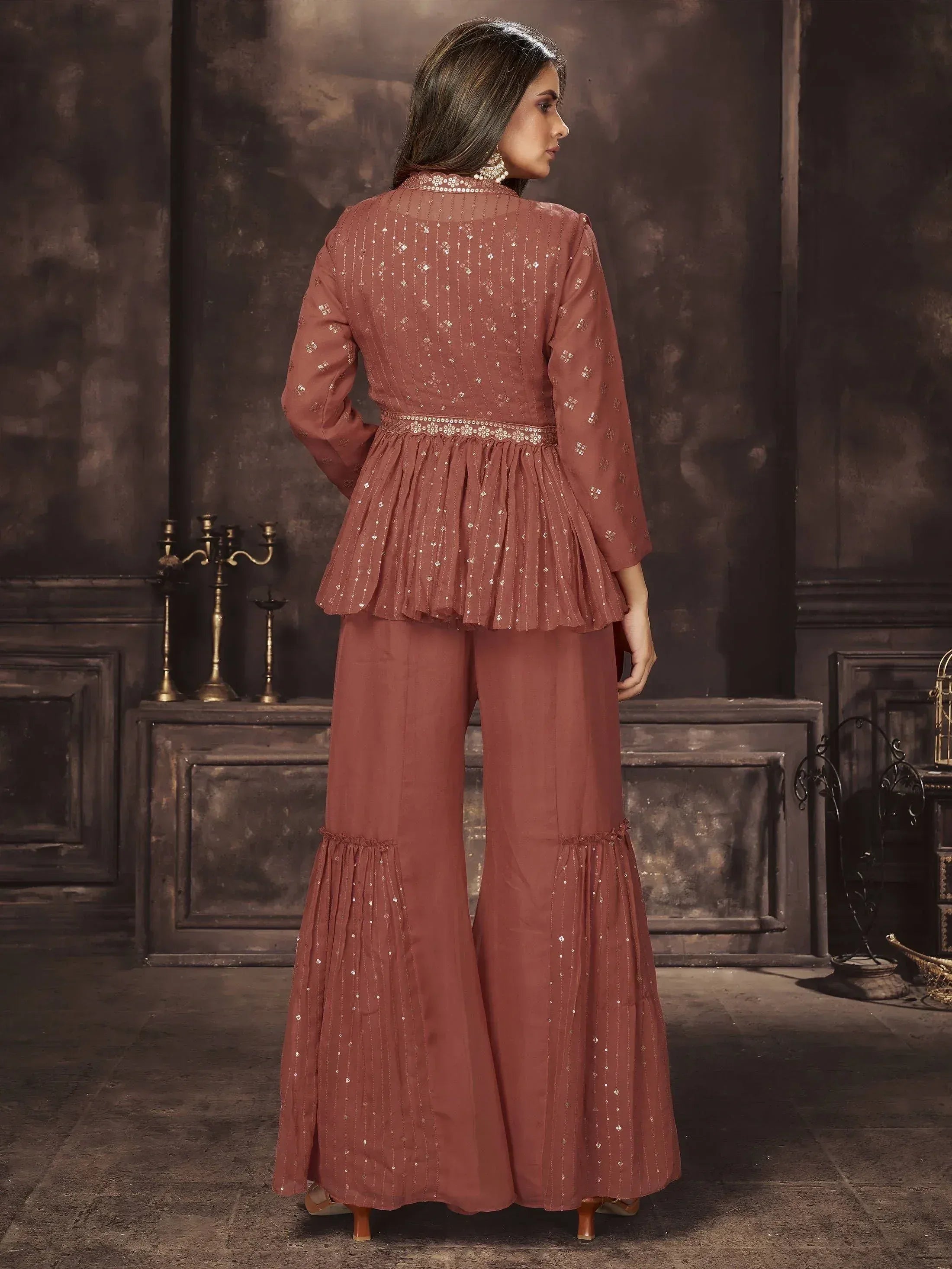 Elegant maroon ethnic palazzo set with sequin detailing and flared pants for festive occasions