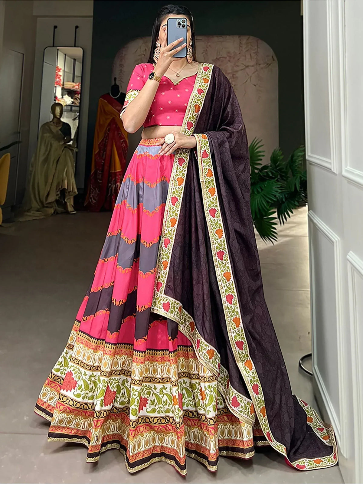 Pink and purple designer lehenga choli with floral border, perfect for Indian ethnic wear occasions