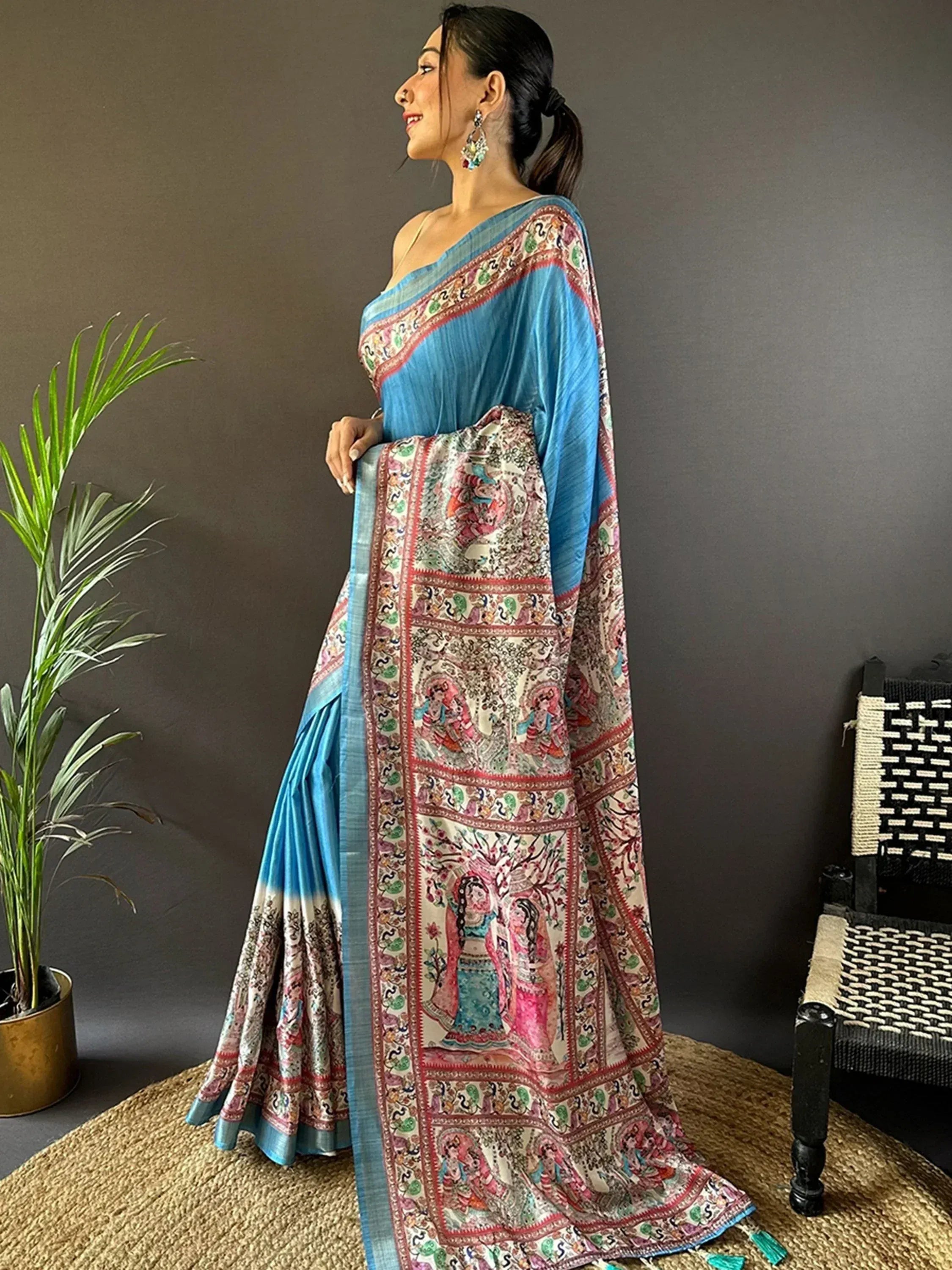 Blue printed saree with intricate ethnic motifs, perfect for Indian festive occasions and traditional wear.