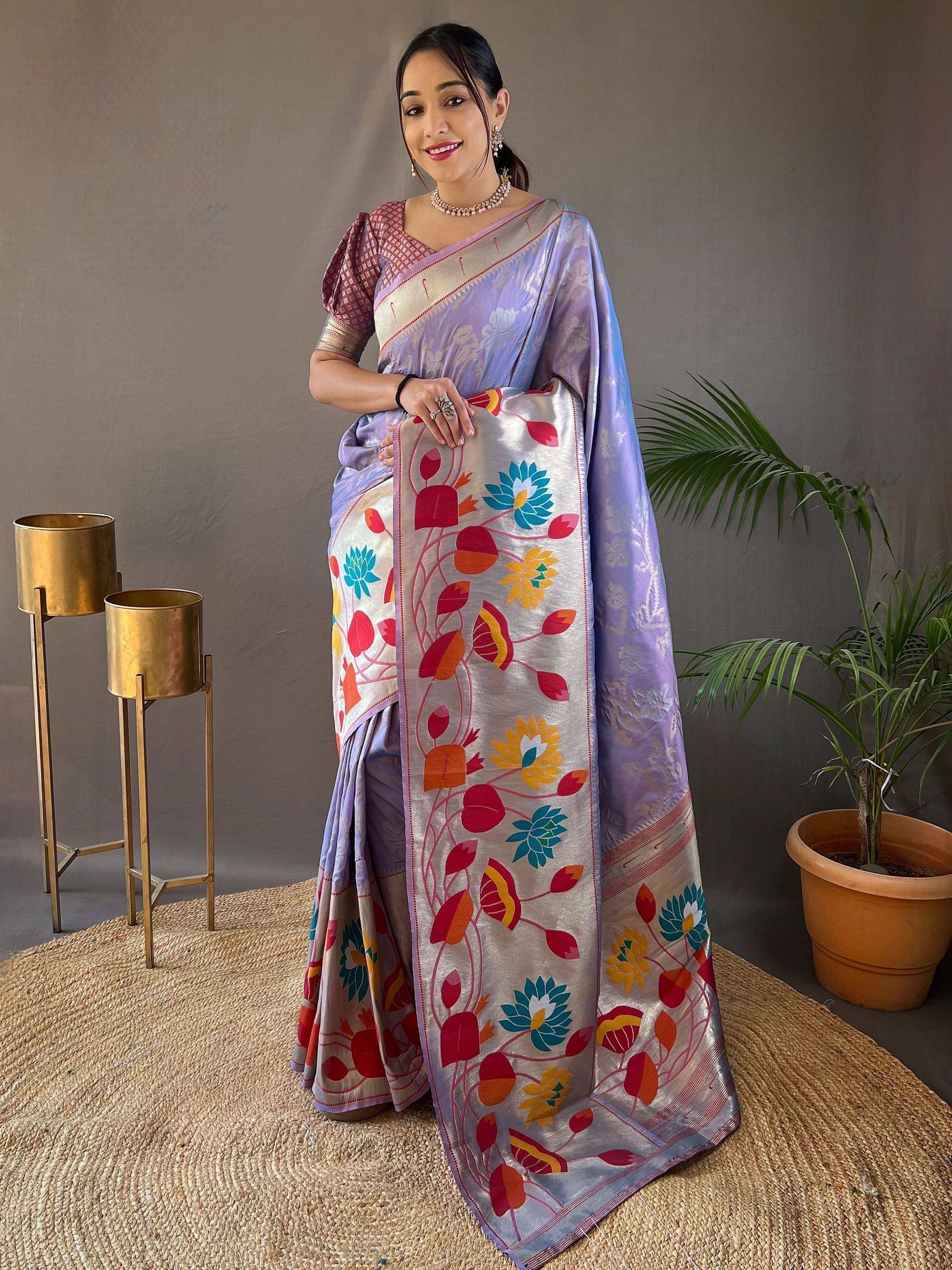 Purple floral saree with vibrant embroidery, perfect for ethnic wear occasions