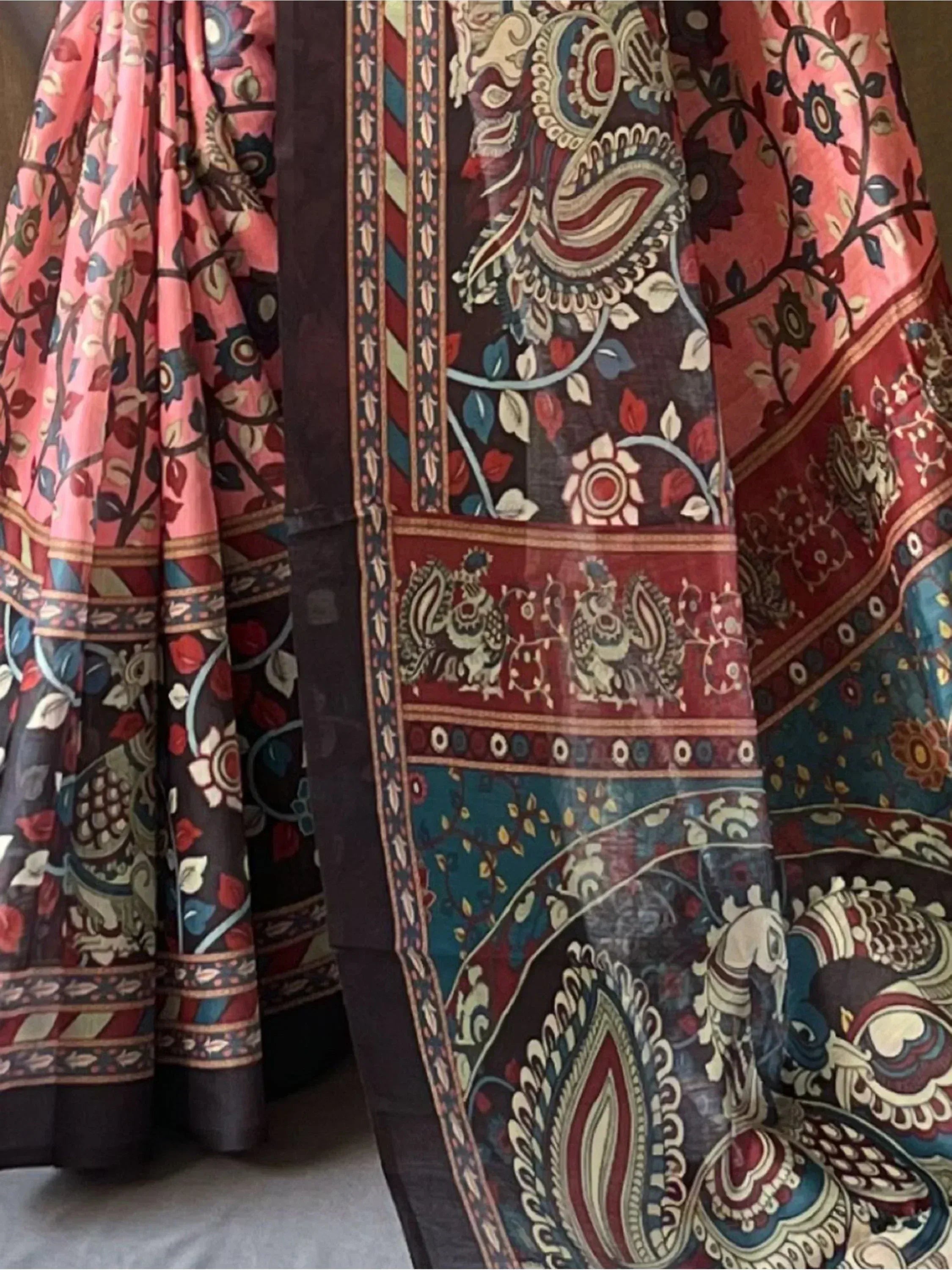 Indian ethnic lehenga with intricate paisley and floral prints in vibrant colors