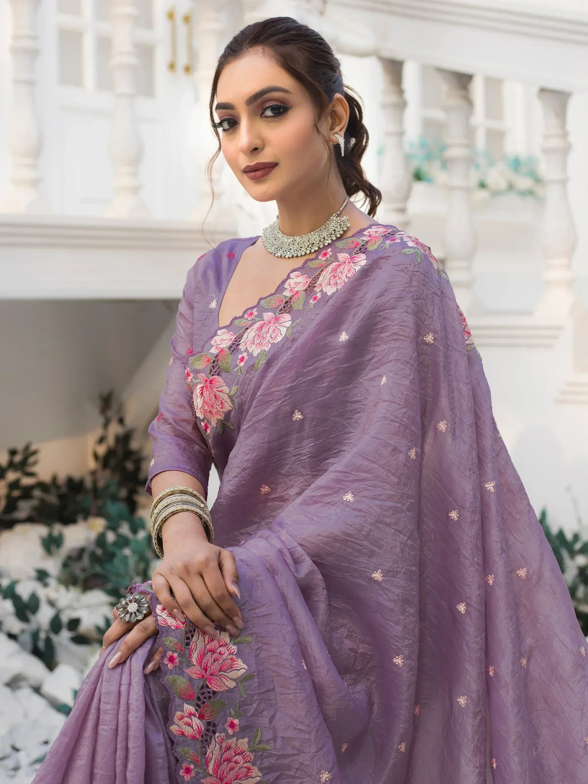 Purple floral embroidered lehenga choli with designer neckline, perfect for Indian ethnic wear occasions