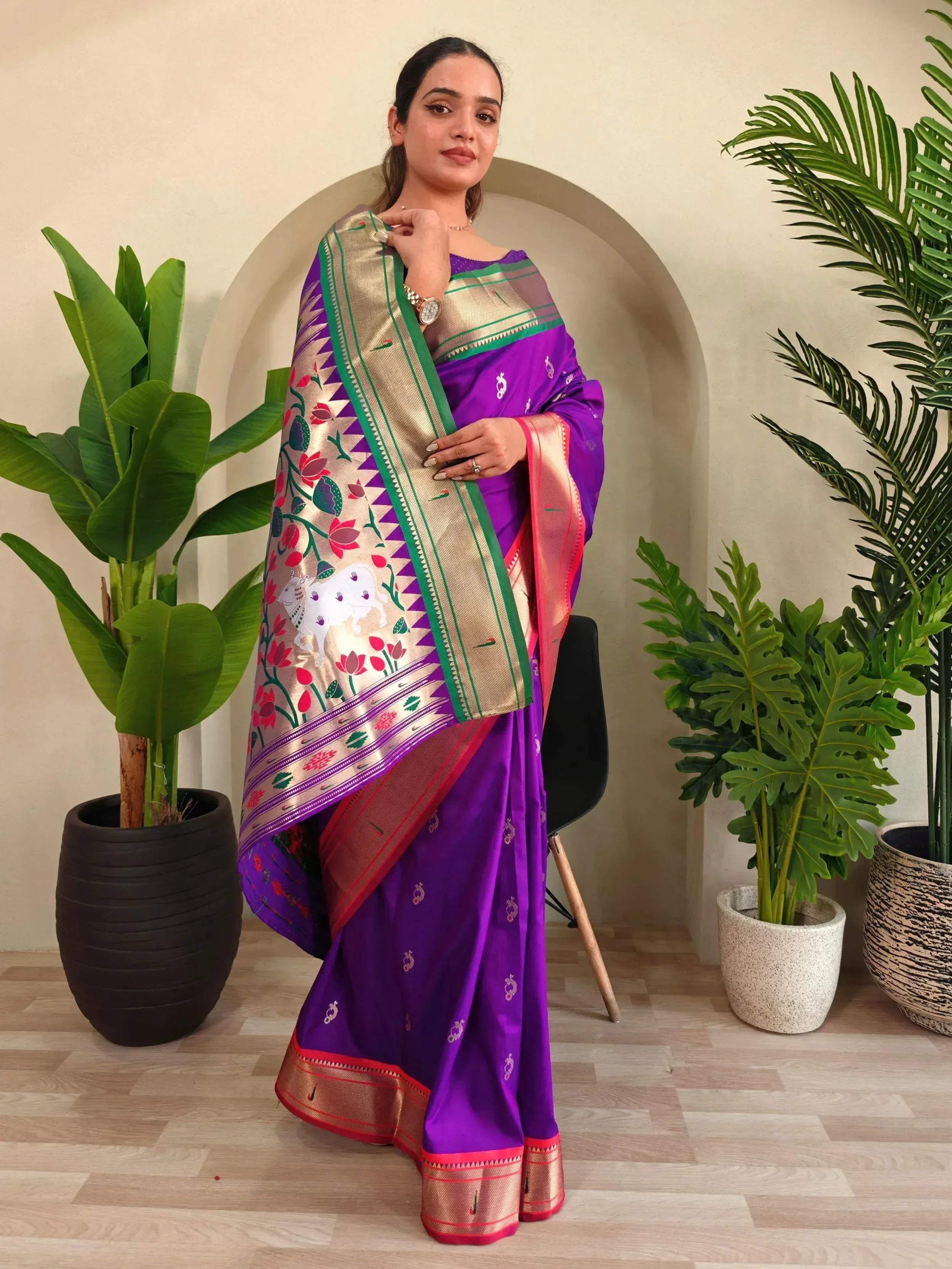 Purple ethnic saree with floral and elephant print, gold border, perfect for Indian occasions