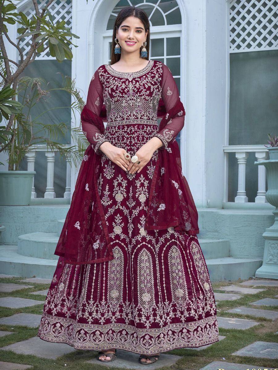 Maroon embroidered lehenga choli with sheer sleeves, perfect for Indian weddings and festive occasions.