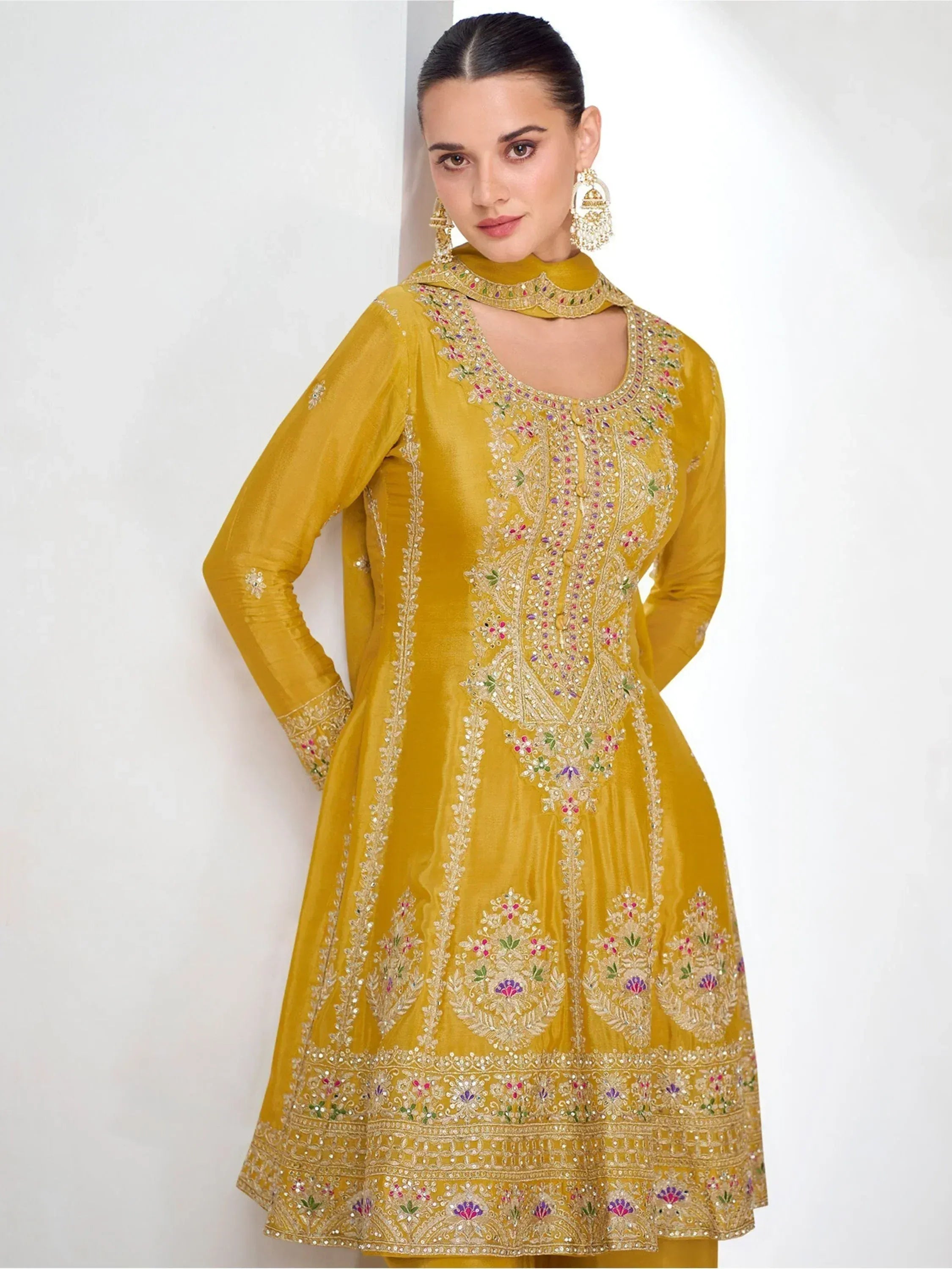 Yellow embroidered Indian ethnic anarkali suit with floral detailing and choker neckline