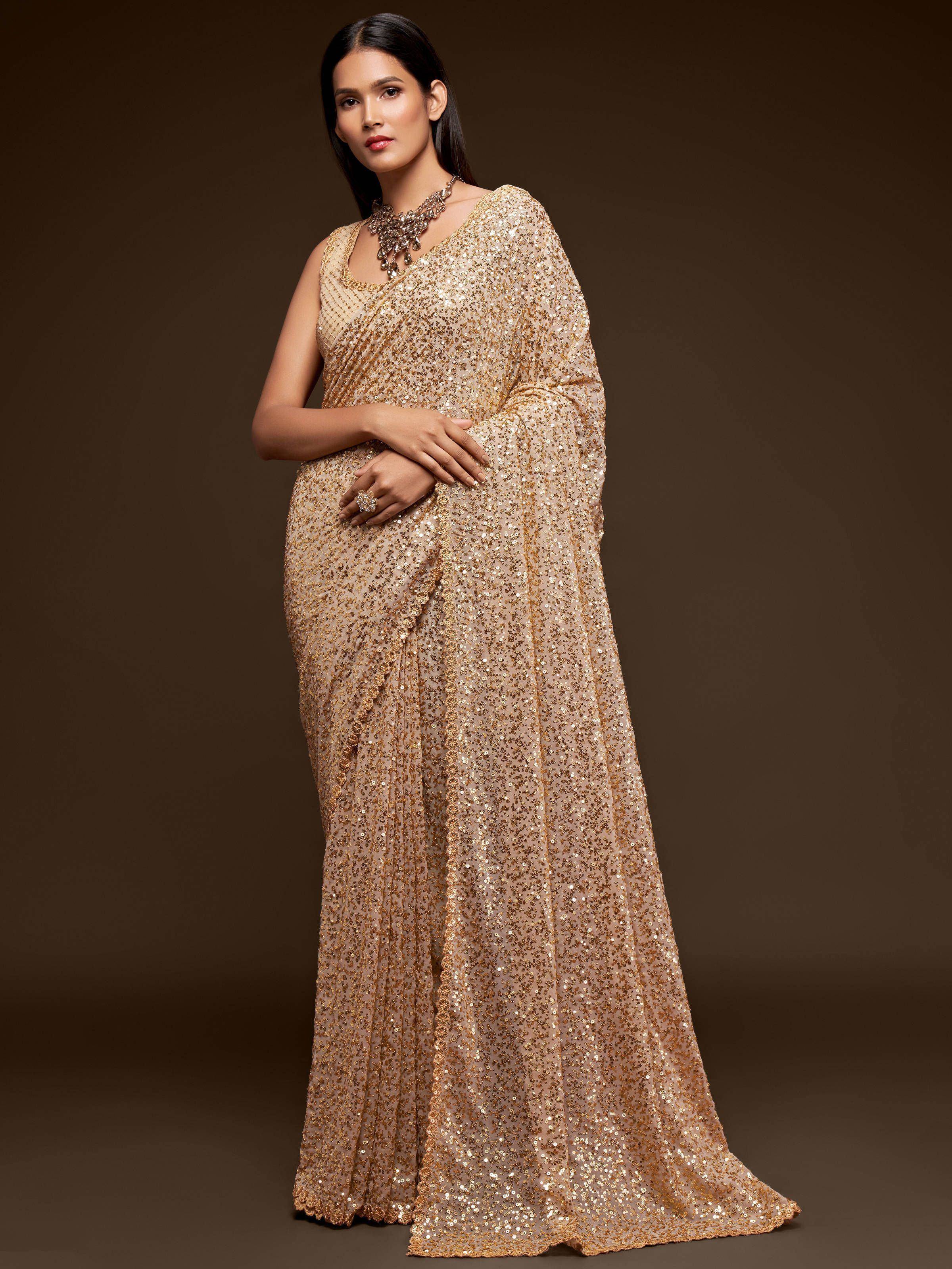 Gold sequin saree with designer blouse, perfect for Indian ethnic occasions and weddings