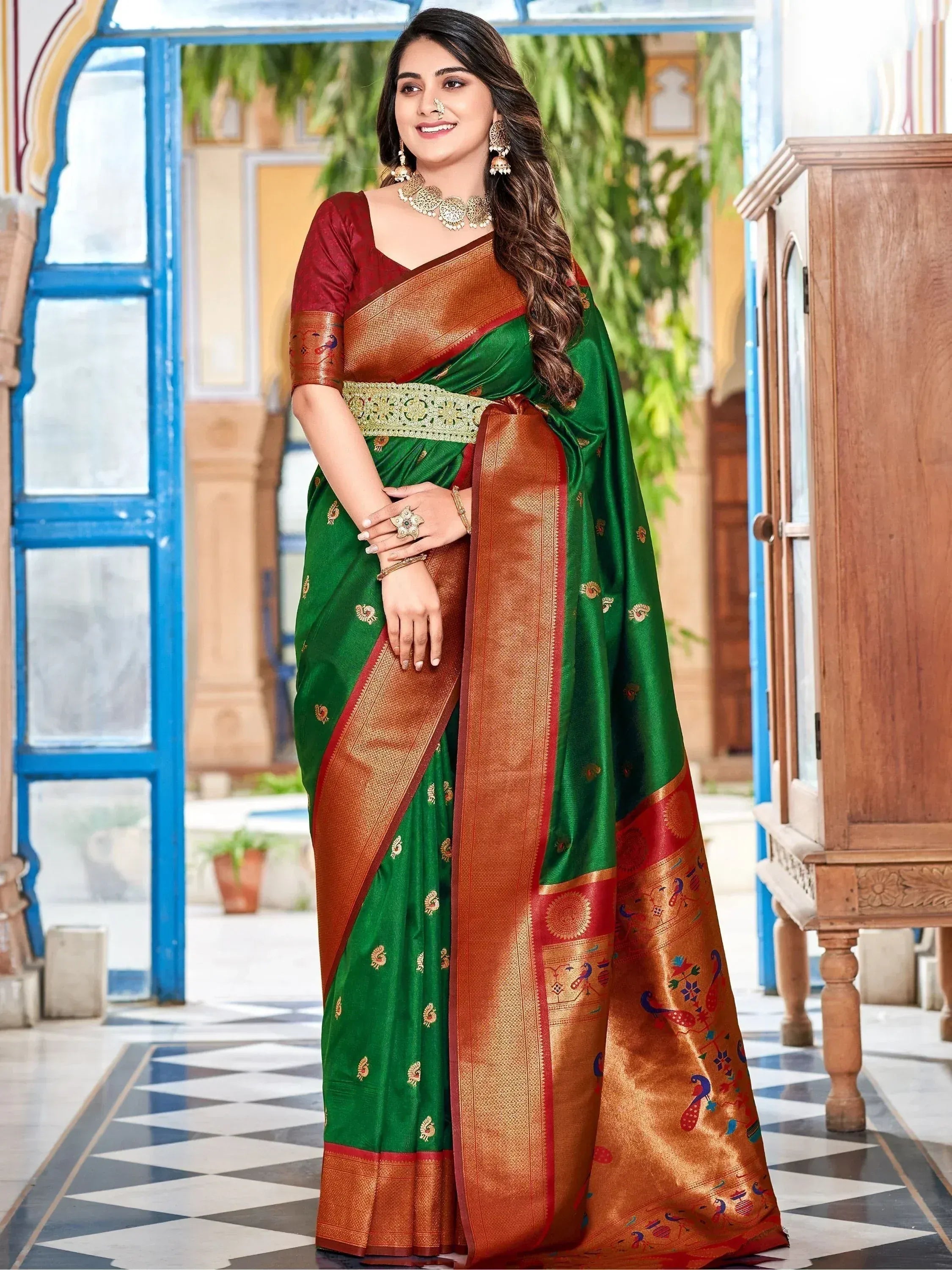 Green and gold designer saree with peacock motifs, perfect for Indian ethnic wear occasions