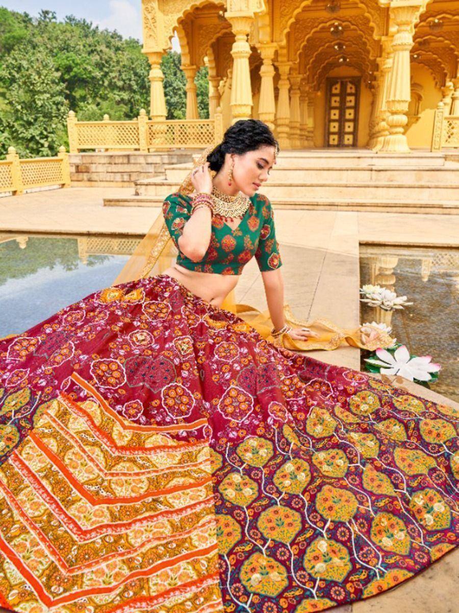 Woman in vibrant floral lehenga choli at palace, Indian ethnic wear